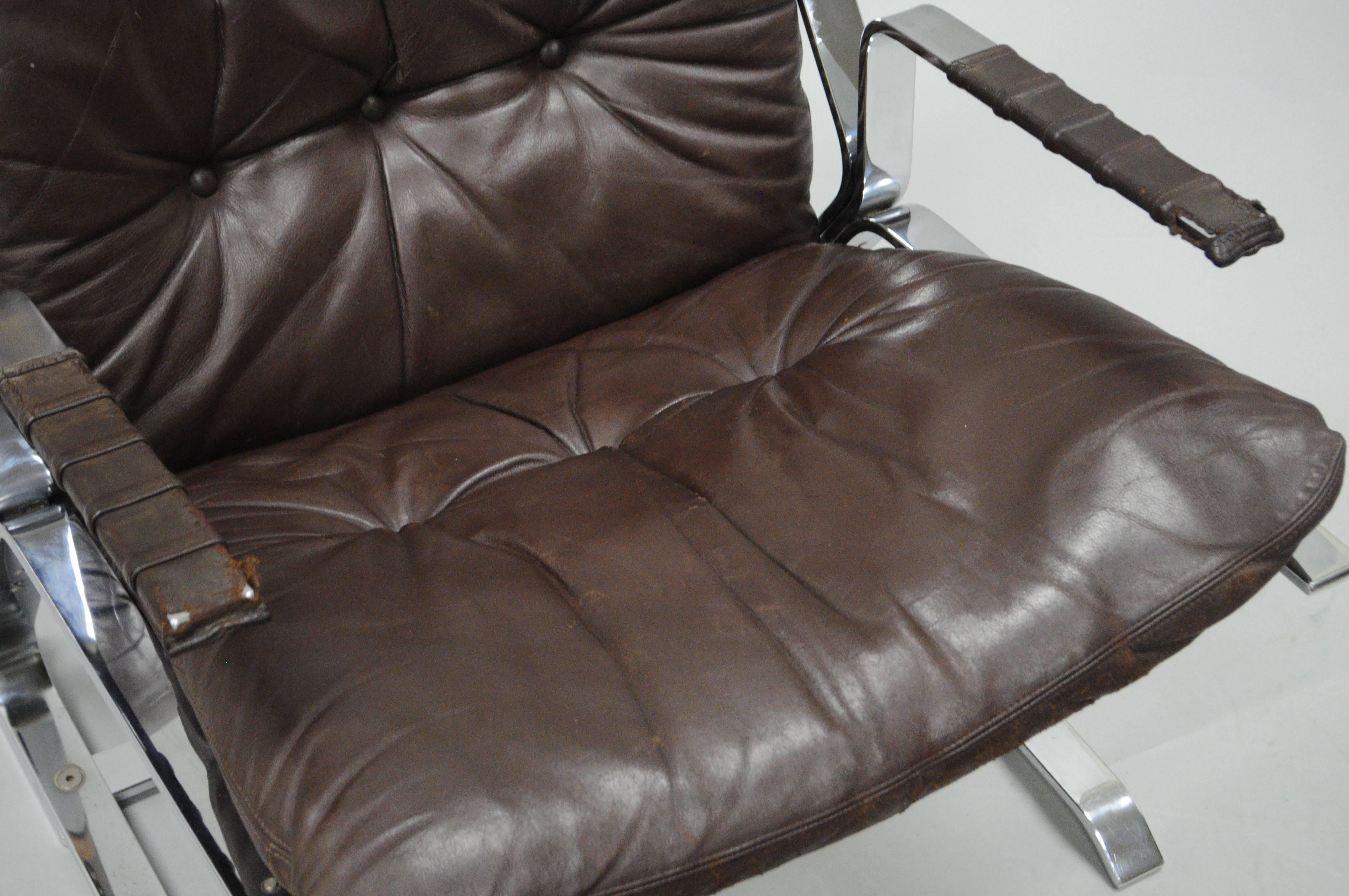 Pirate Lounge Chair Brown Leather & Chrome by Elsa & Nordahl Solheim for Rykkin In Good Condition For Sale In Philadelphia, PA