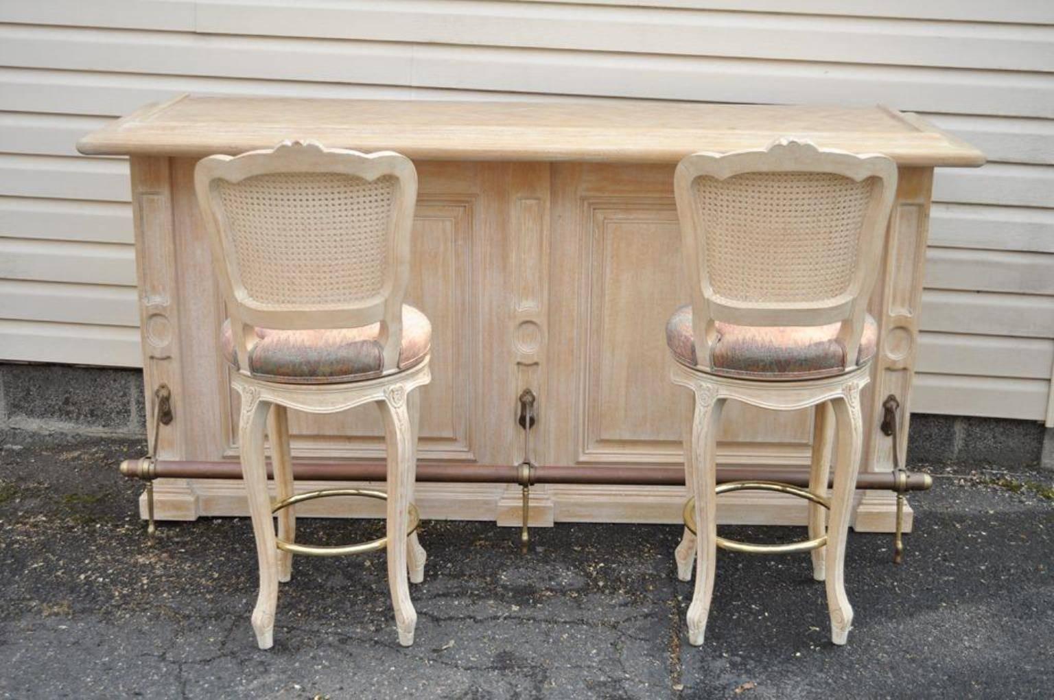 Brass French Louis XV Style Bar Counter and Pair of Cane Swivel Bar Stool Chairs