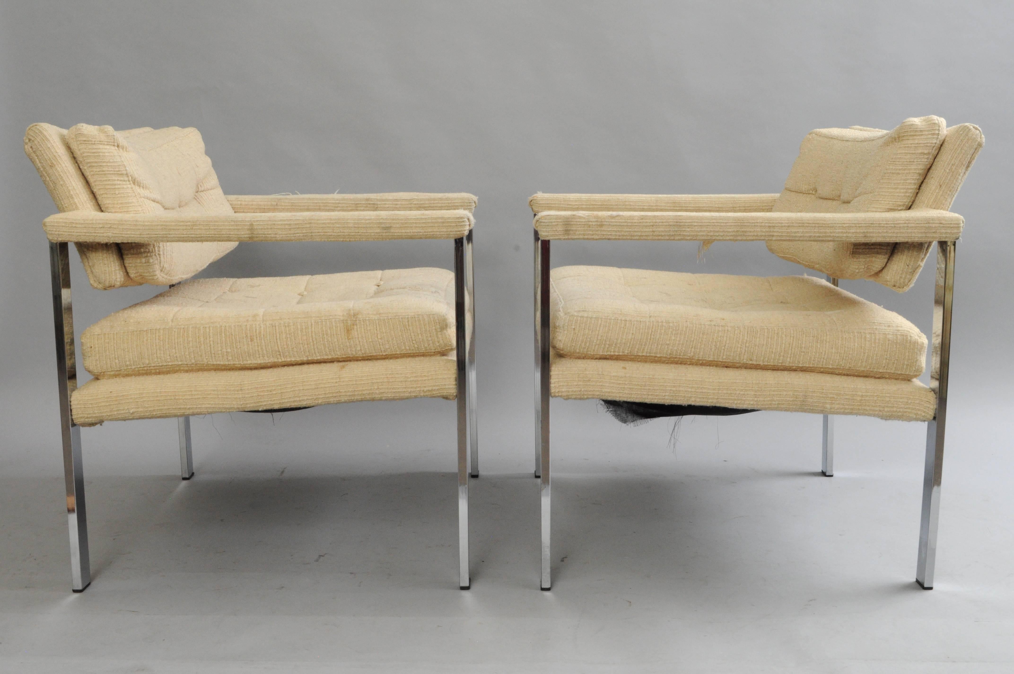 Pair of vintage Mid-Century Modern chrome flat bar arm chairs after Milo Baughman. The pair features sleek chrome frames, upholstered backs, seats and armrests, clean Modernist lines.