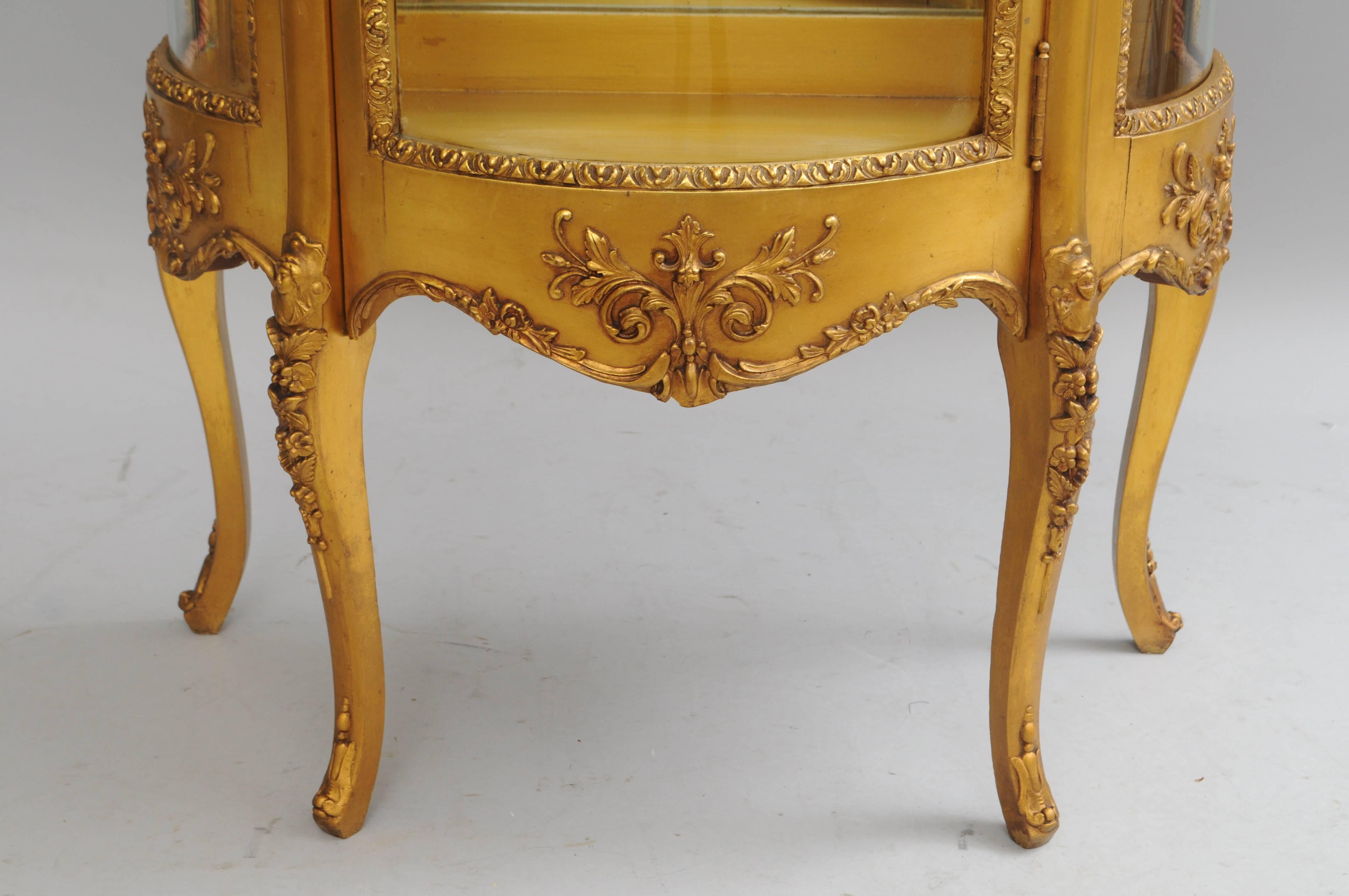 antique gold curio cabinet