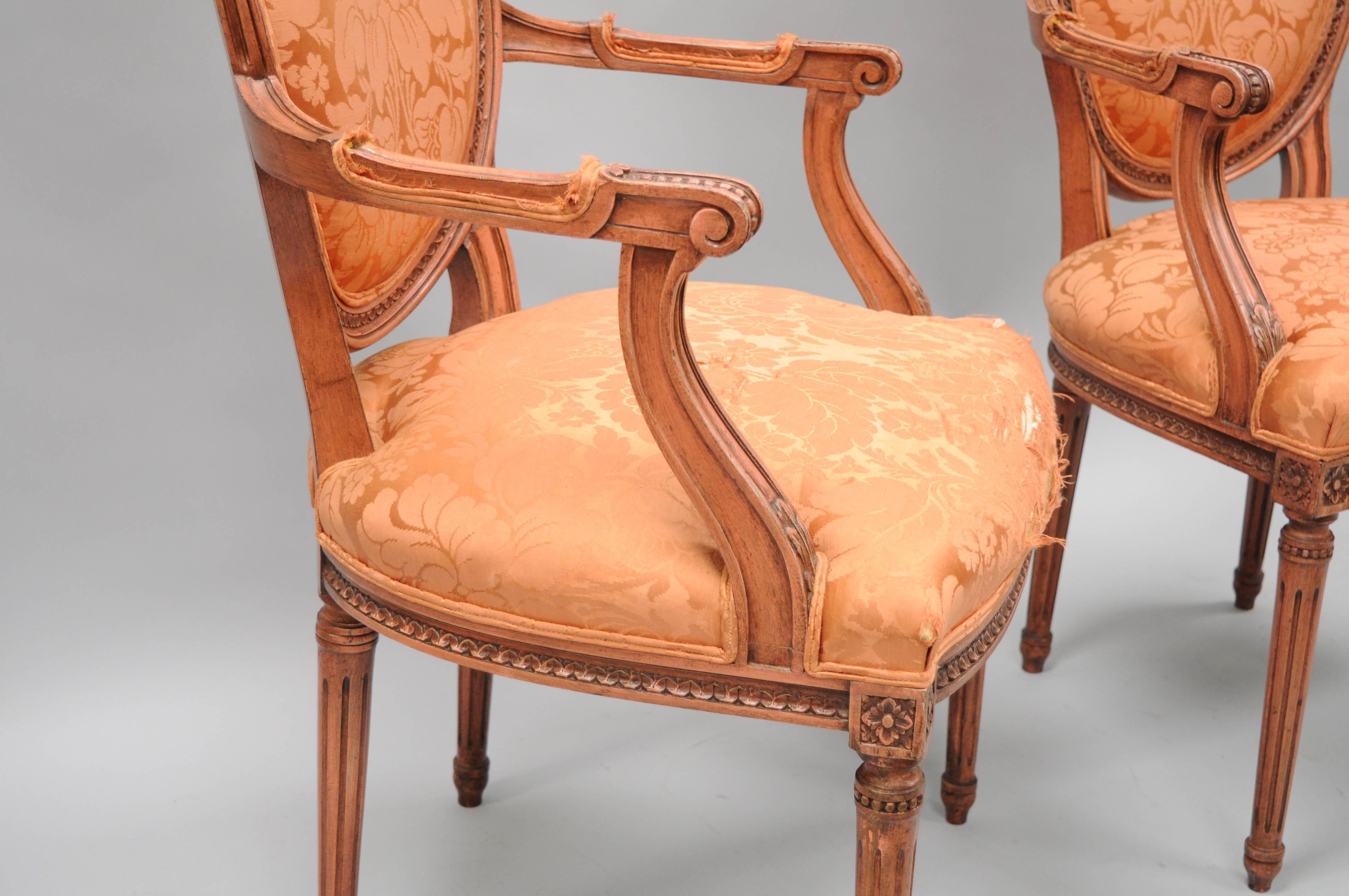 Pair of French Louis XVI Style Pink Distress Painted Oval Back Dining Arm Chairs In Good Condition For Sale In Philadelphia, PA