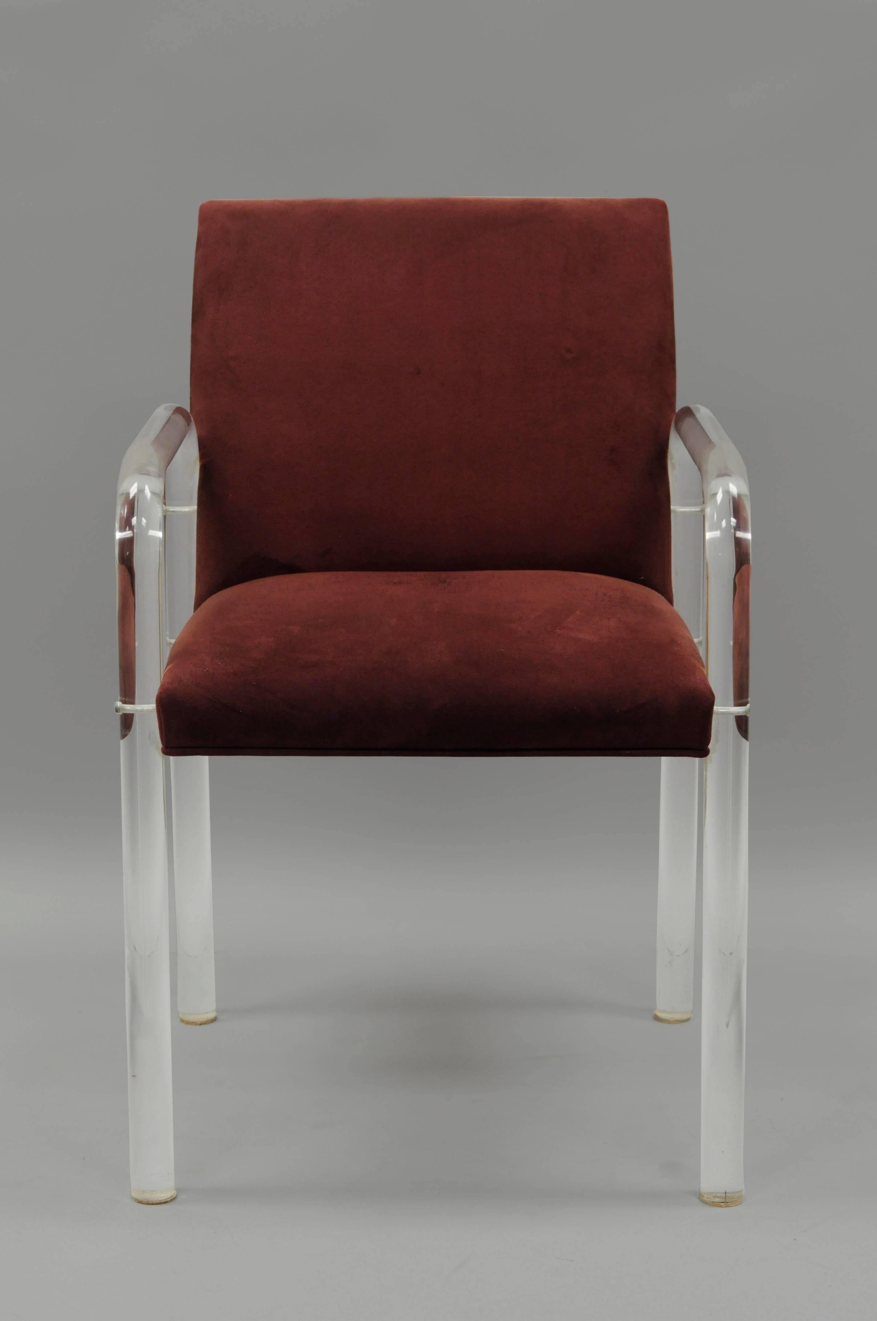 Vintage Mid-Century Modern / Hollywood Regency curved Lucite armchair after Charles Hollis Jones. Item features clean modernist lines with a simple clear Lucite frame and upholstered back and seat. Measure: 25