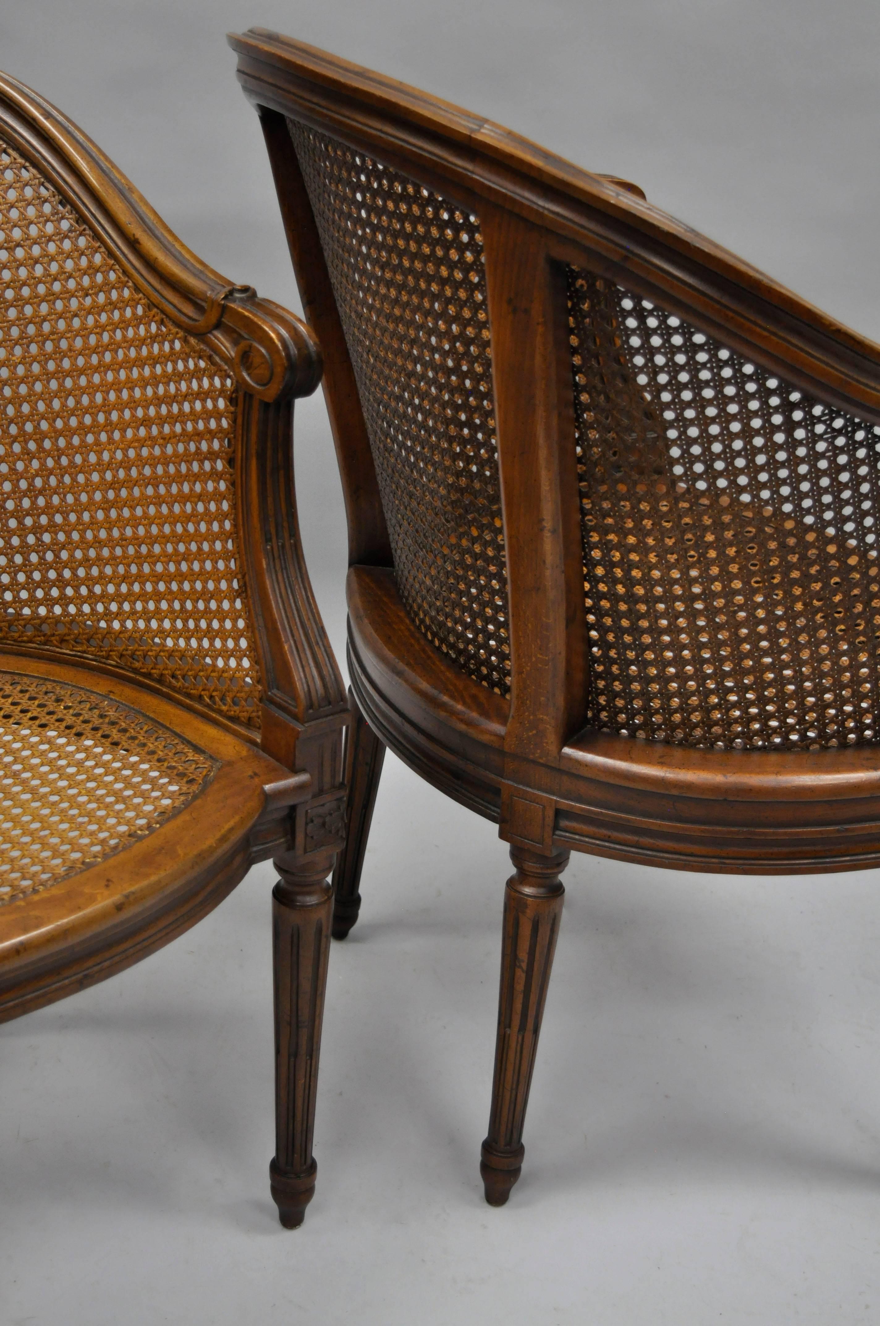 American Pair of French Louis XVI Style Walnut and Cane Barrel Back Chairs by Heritage