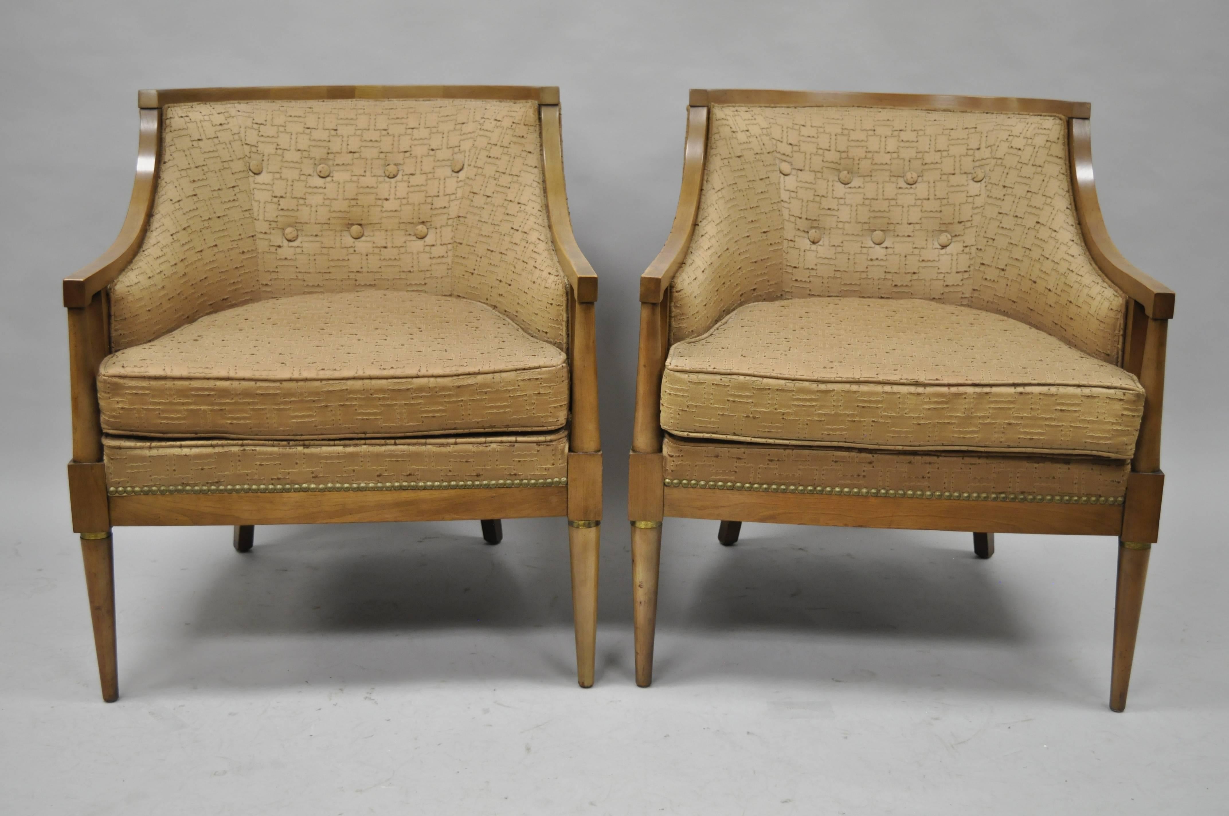 Pair of Vintage Mid-Century Modern Barrel Back Solid Wood Lounge Chairs in the Paul McCobb Style. Item features solid wood construction, barrel backs, tapered legs, brass rings, great style and form. Wonderful to lacquer and reupholster.
