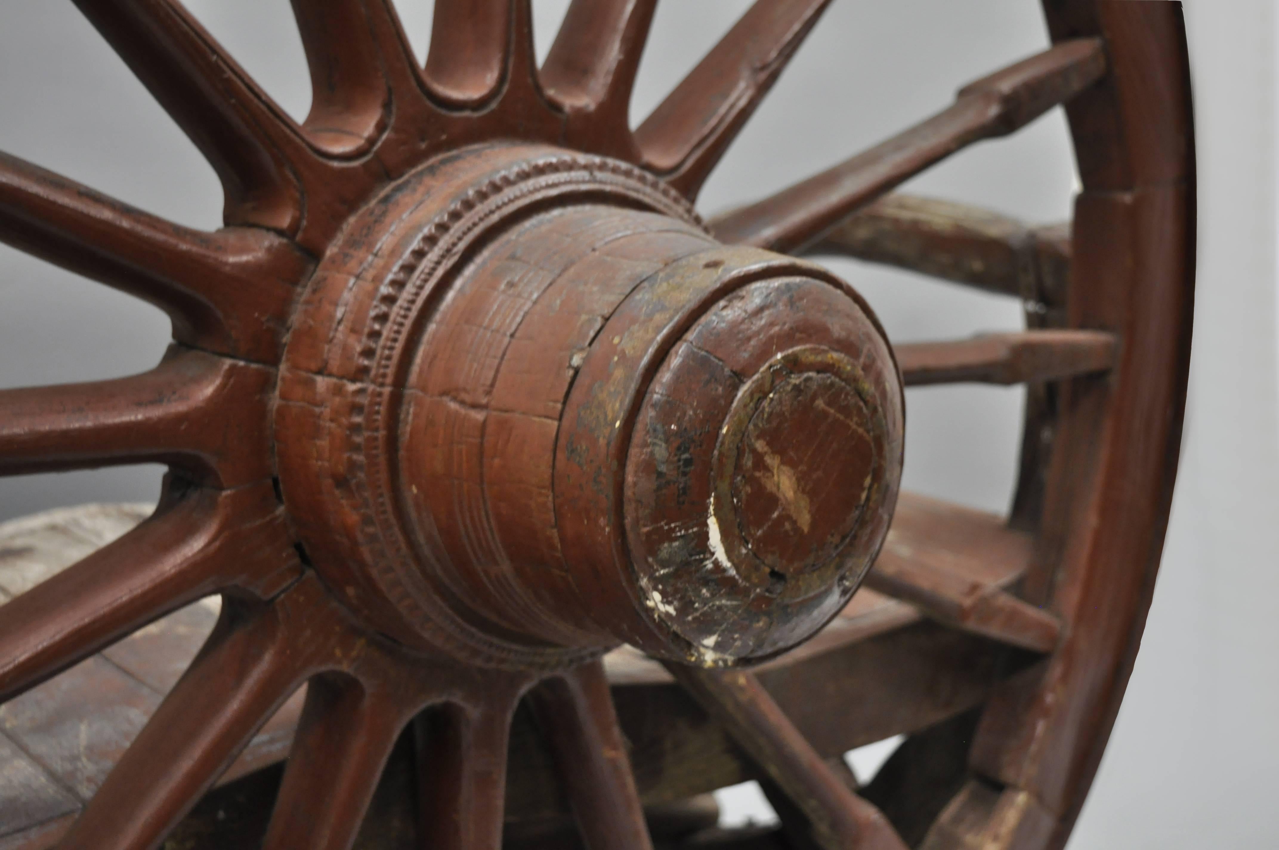 antique wagon wheel bench
