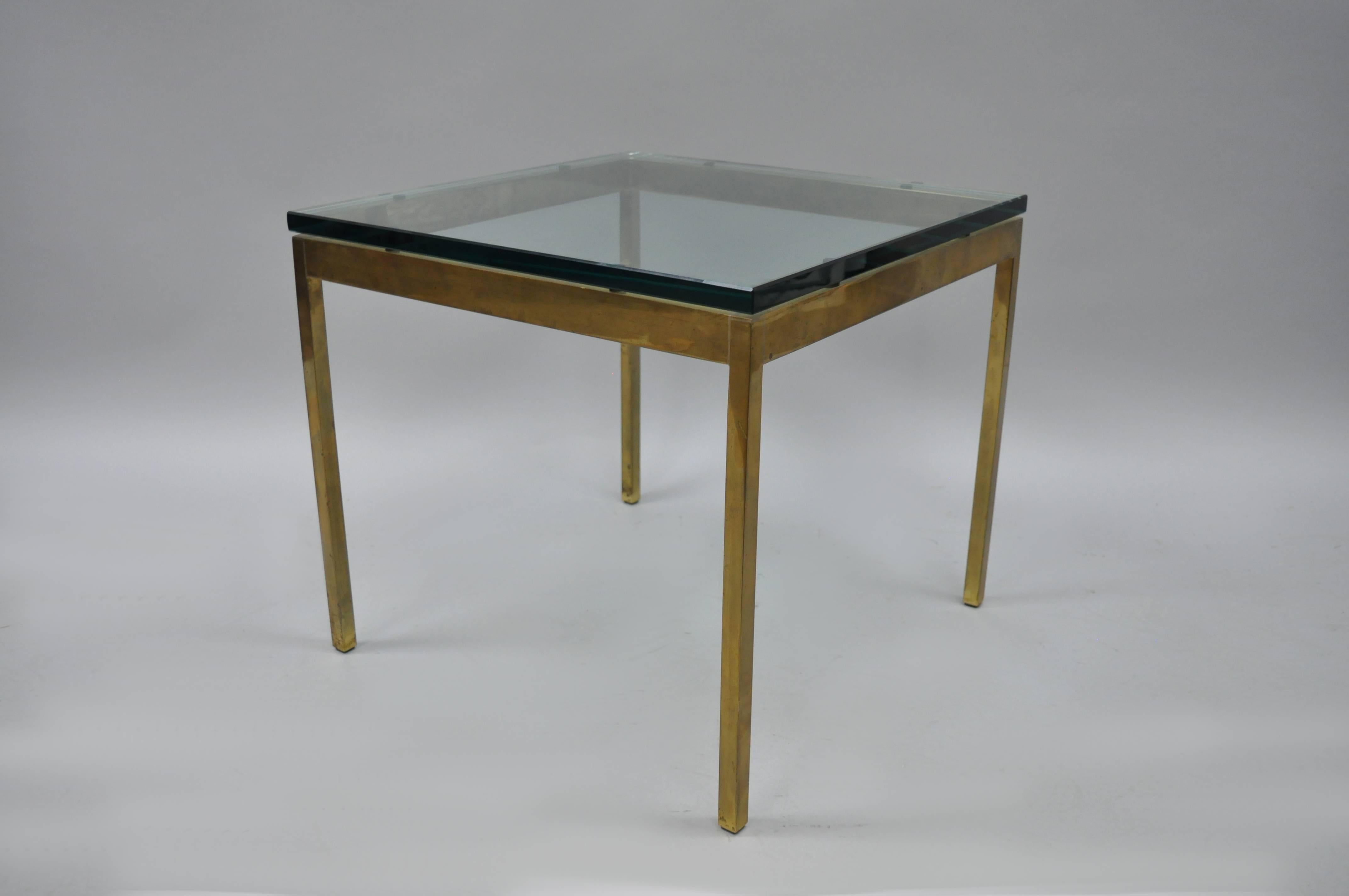 Vintage Mid-Century Modern burnished brass / bronze finish accent table by Scope Furniture Ltd. Item features a metal base with burnished brass/bronze finish and a thick glass top. Original manufacturer label to underside.