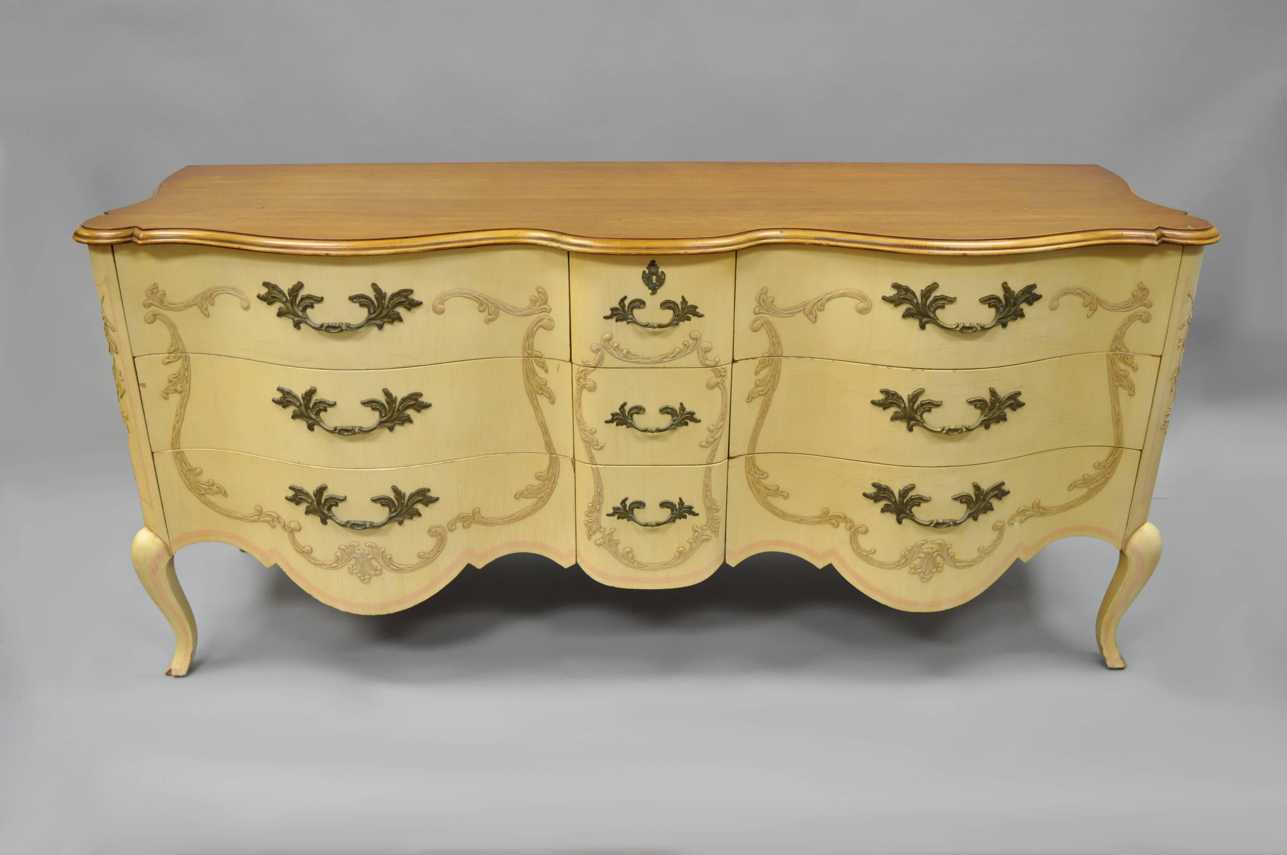 Vintage French Provincial Louis XV style cherry long dresser by John Widdicomb. Item features beautiful wood grain, shapely serpentine form, nicely carved details, quality American craftsmanship, nine dovetailed drawers, cabriole legs, and paint