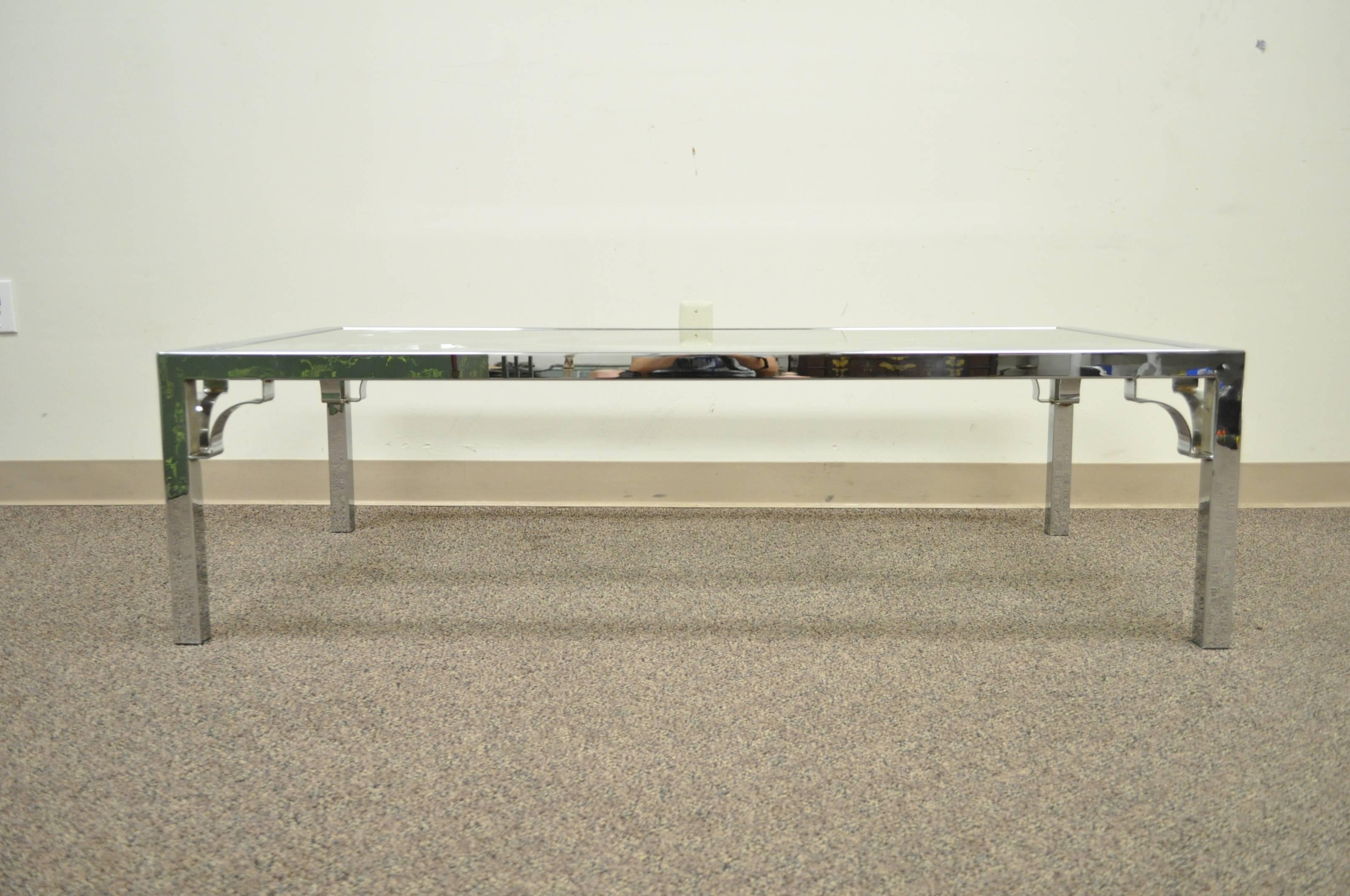 Mid Century Modern Chrome X-Frame Glass Top Hollywood Regency Coffee Table In Good Condition For Sale In Philadelphia, PA