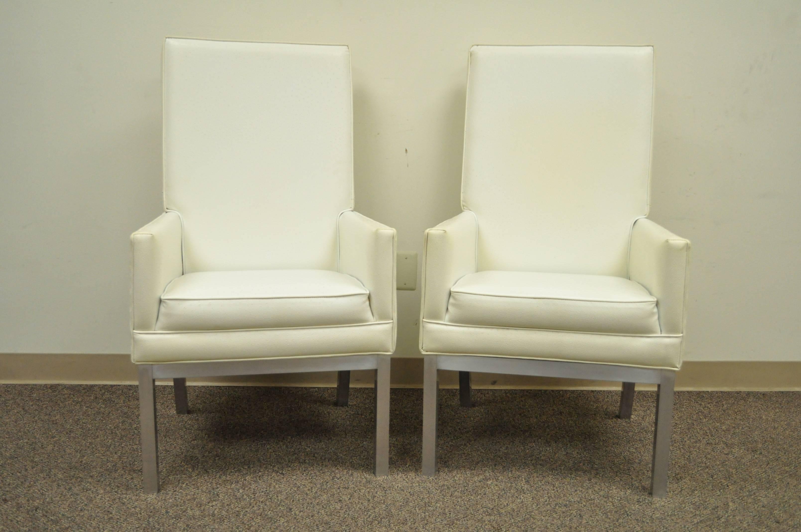 Great Pair of Vintage, Modernist, Armchairs in the Parsons Style. The pair features tall comfortable backs, angled rear legs, clean lines, brushed aluminum bases, and great overall form. 