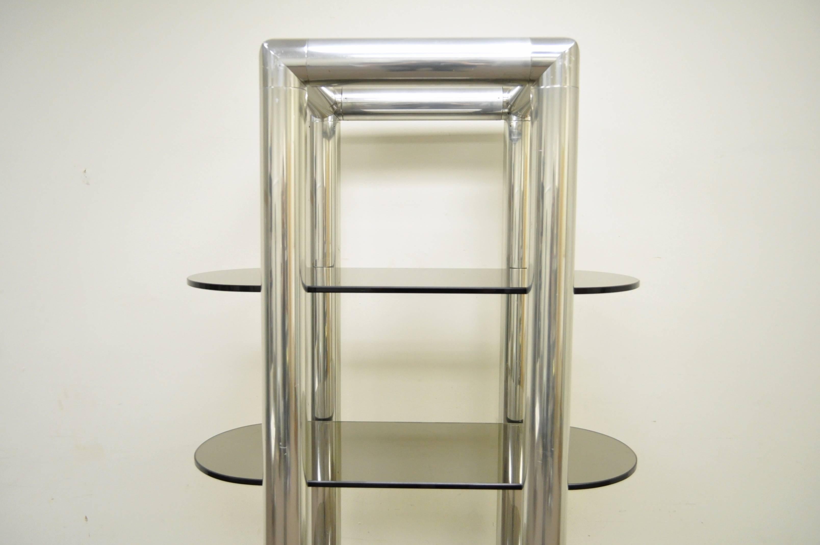 Very unique vintage etagere in thick tubular aluminum with. 5