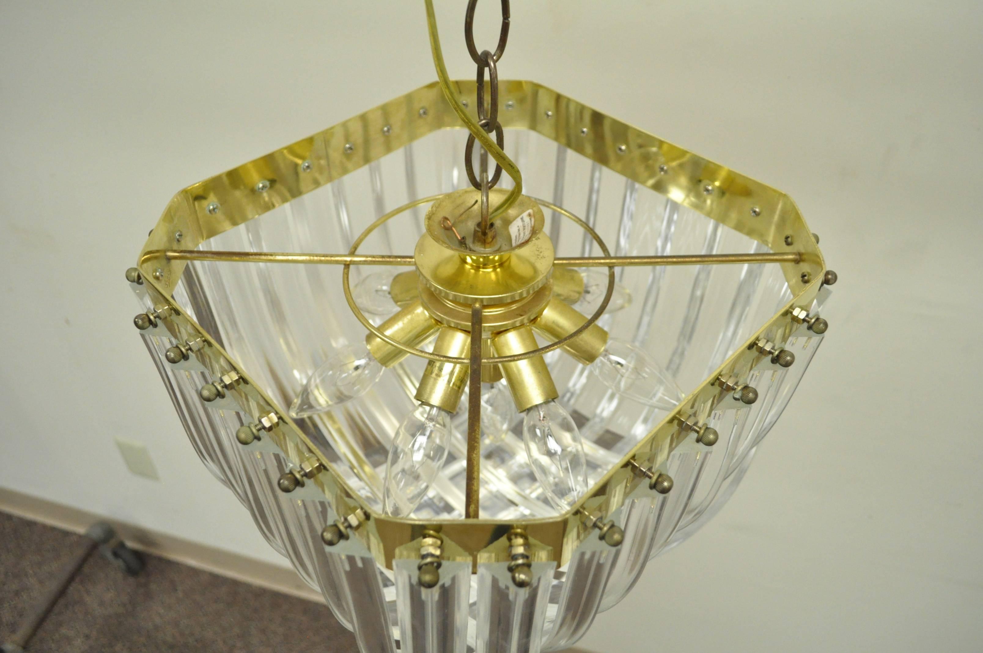 20th Century Vintage Hollywood Regency Brass and Lucite Ribbon Loop Chandelier