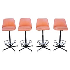 Vintage Mid Century Modern Taburetes giratorios de metal y vinilo naranja atómico - Set de 4