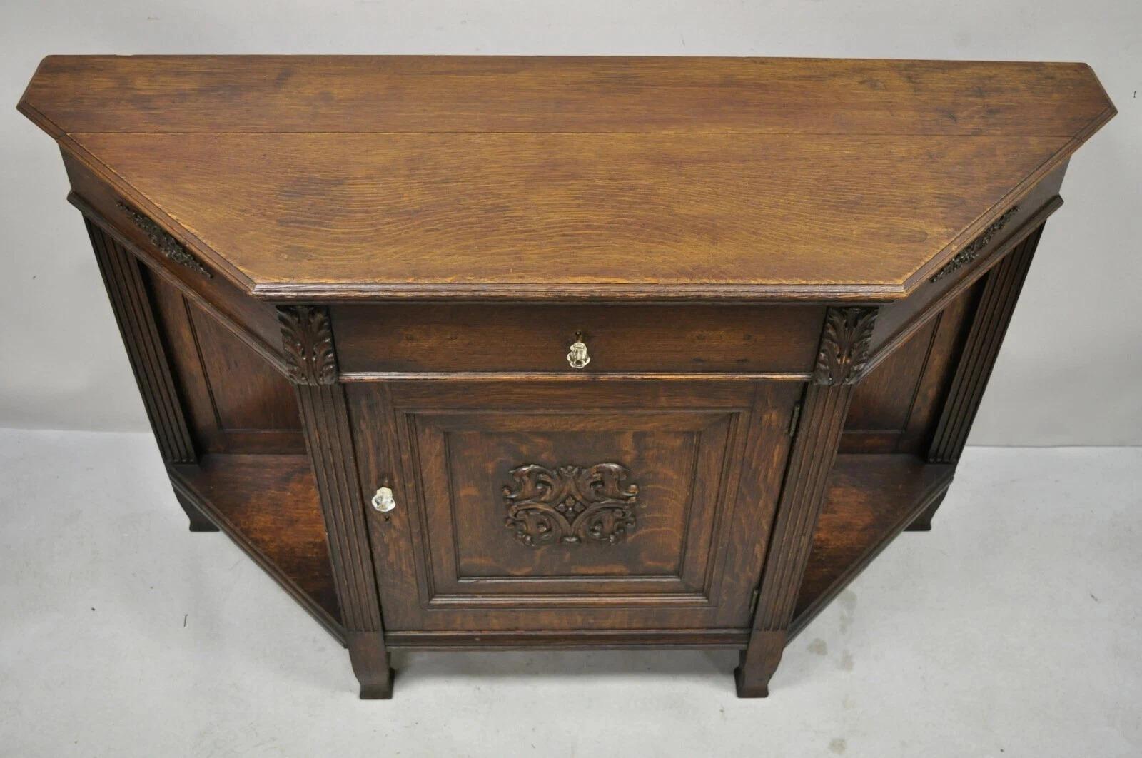 Antique French Renaissance Revival Oak Wood Console Table Cabinet. Item features beautiful wood grain, nicely carved details, one swing door, no key, but unlocked, one drawer. Circa Early 20th Century. Measurements: 35