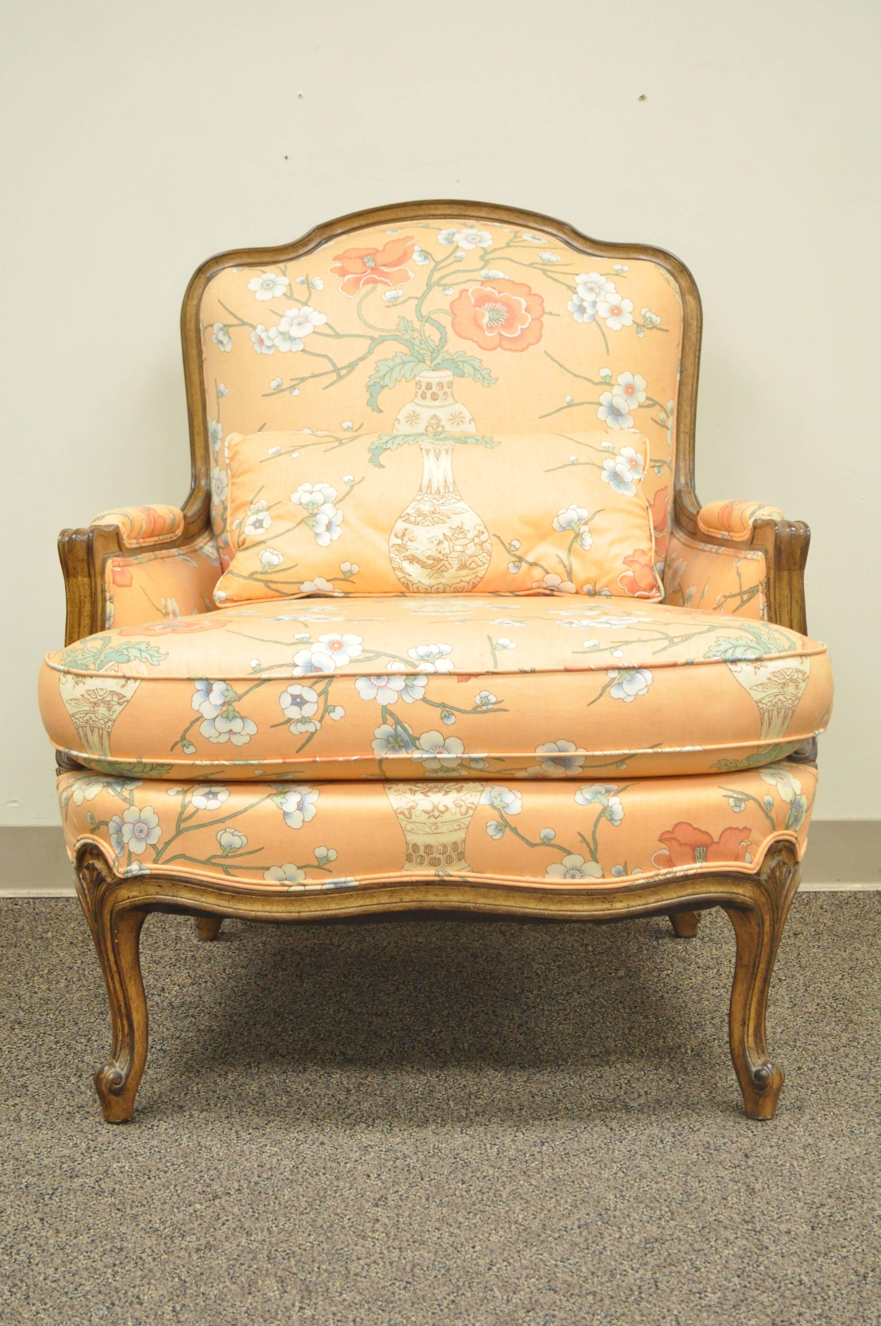 Quality vintage 1950s, French country Louis XV style shell carved bergere armchair and matching curved ottoman. Lounge chair and stool features shapely cabriole legs, shell carved accents and Classic and elegant form. Ottoman measures 19