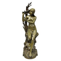Scultura francese in bronzo di Edouard Drouot (1859-1945) intitolata "La Rosse", raffigurante una donna