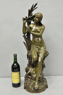 Scultura francese in bronzo di Edouard Drouot (1859-1945) intitolata "La Rosse", raffigurante una donna