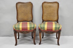 Antique French Country Louis XV Carved Walnut Cane Back Side Chairs - a Pair
