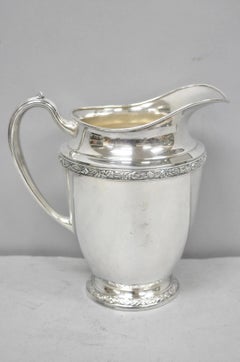 Pichet à eau vintage de style victorien « Oneida Maybrook », en métal argenté, orné de motifs floraux en repoussé