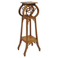 Table d'appoint vintage de style Art nouveau français, en teck sculpté, sur pied, servant de support pour plantes