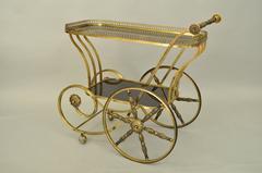 Italian Hollywood Regency Scrolling Brass and Glass Rolling Serving Bar Tea Cart