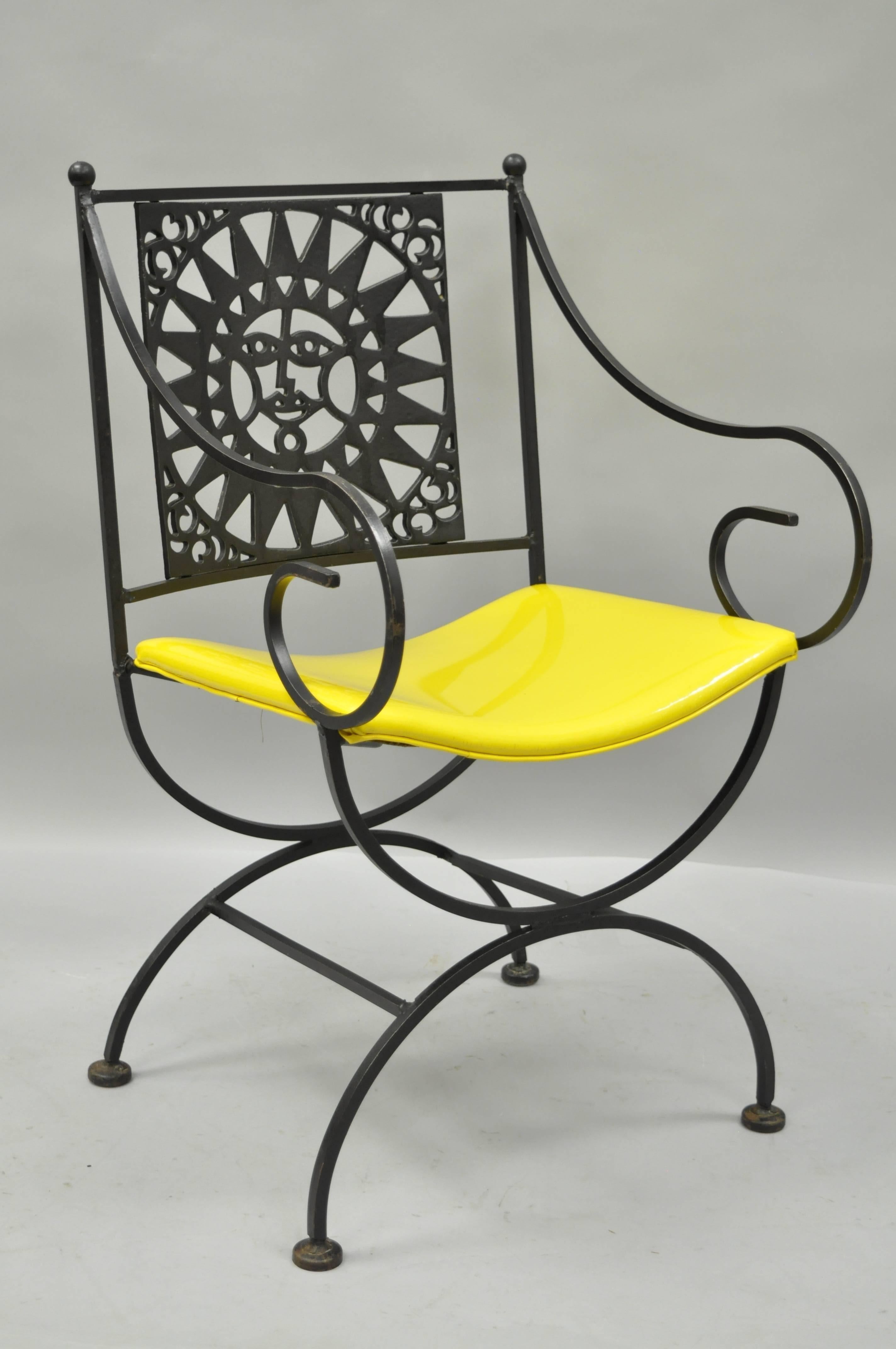 Vintage Mid-Century Modern 1960s wrought iron directors chair with sun back from the Mayan Collection by Arthur Umanoff. This wonderful handcrafted chair features a unique X-form base, ball form finials, whimsically scrolled arms, and bright yellow