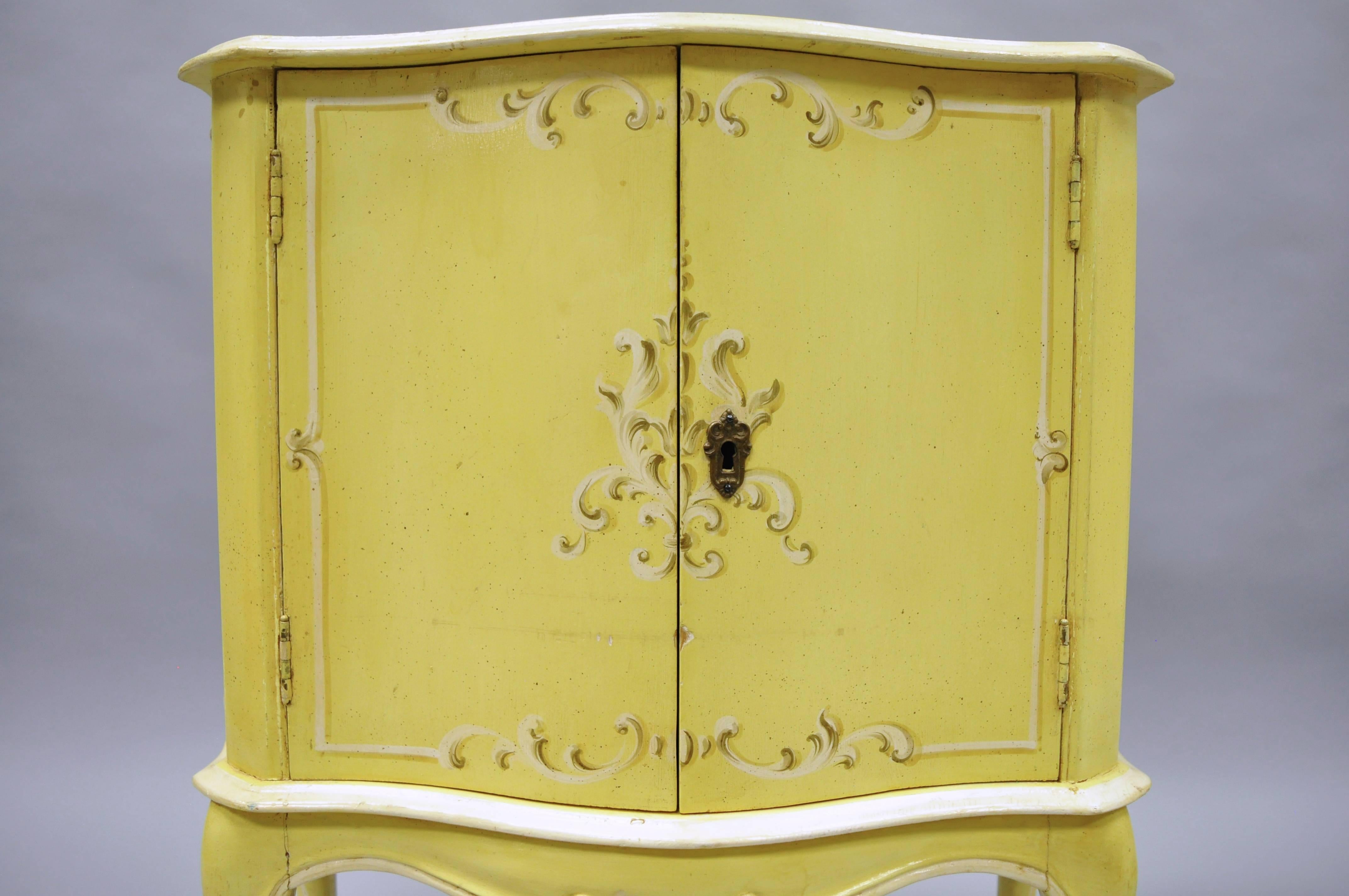 Mid-20th Century Pair of Small Italian Florentine Yellow Floral Painted Bombe Commode Side Chest
