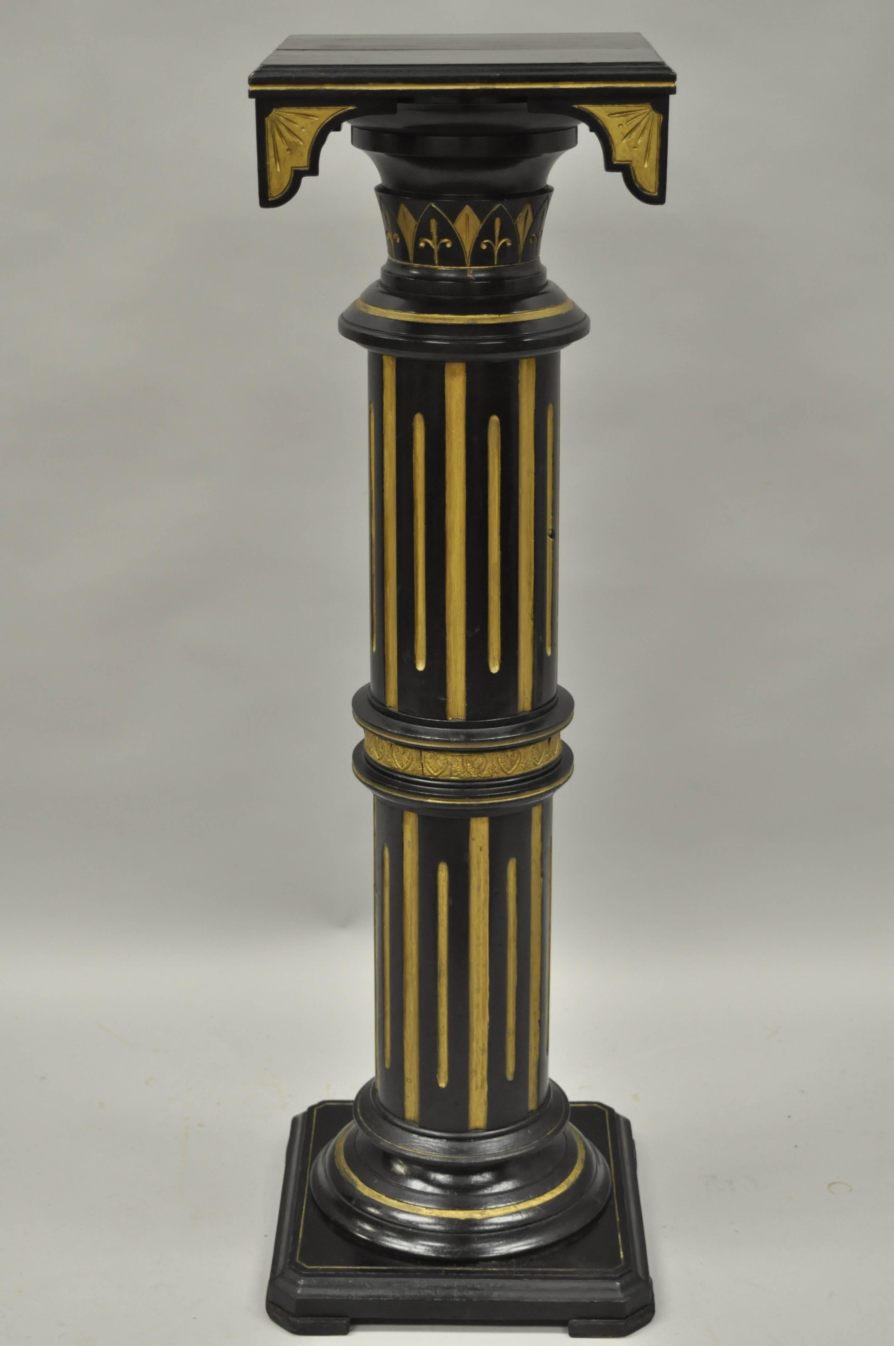 Antique Victorian column-form pedestal plant stand attributed to Herter Brothers. Item features solid wood construction, Black ebonized finish with gold accents, Carved reeded column. Outstanding antique pedestal.
