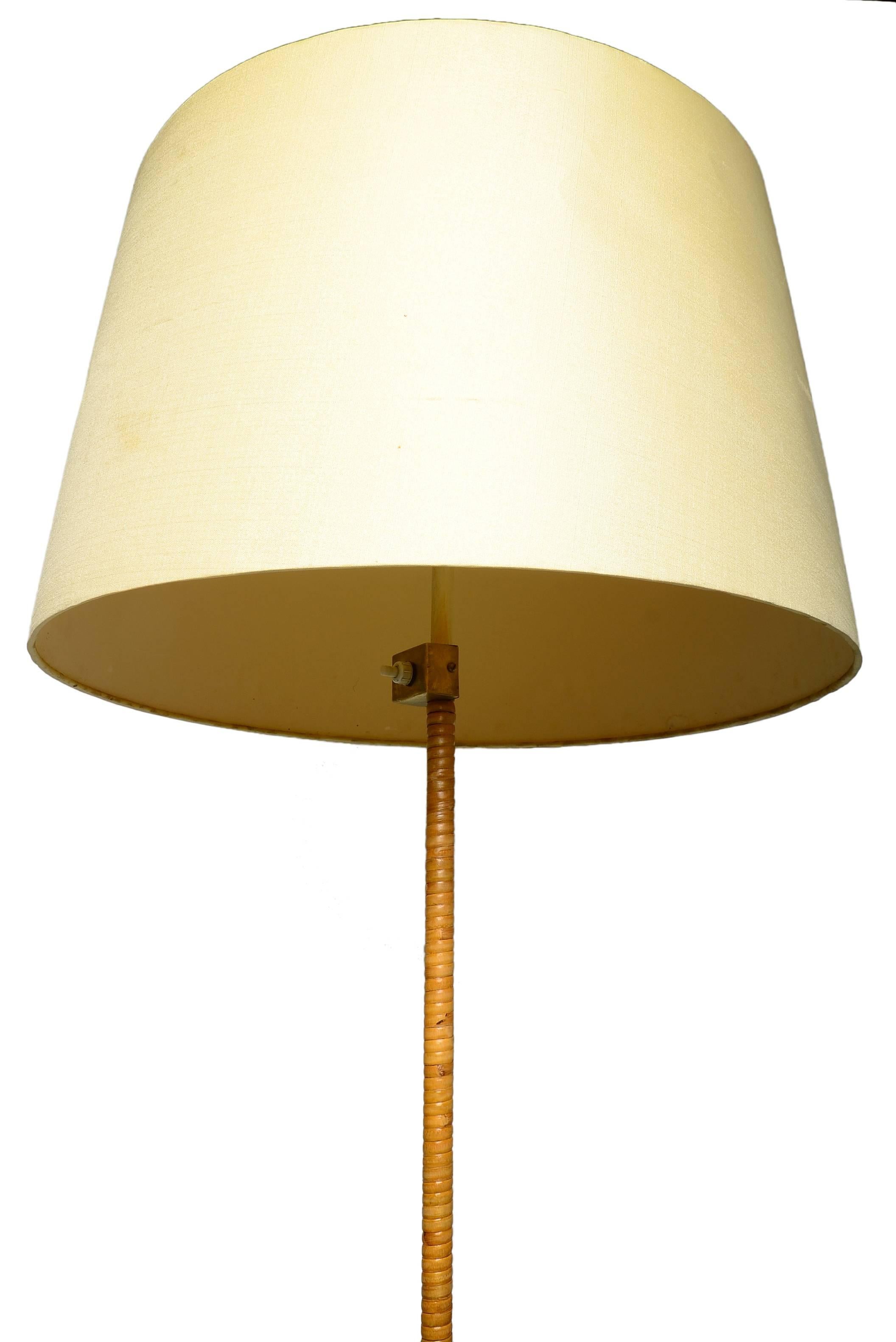 Scandinavian Modern Paavo Tynell Floor Lamp in Brass and Cane