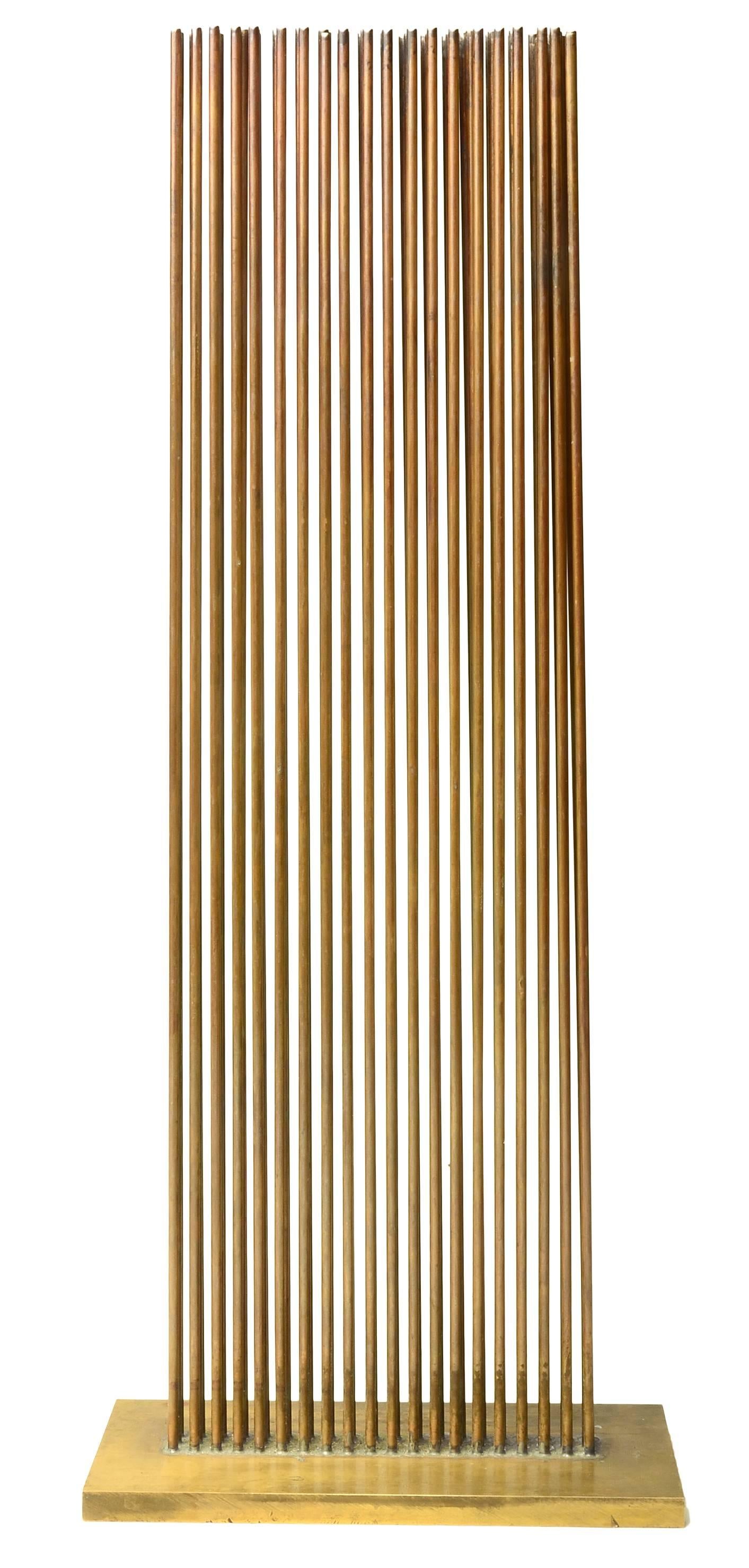 Such a nice example of a Harry Bertoia Sonambient.

This piece has 60 rods silvered in three rows in Beryllium on a thick brass base. 

Incredibly bright and loud sounds that are unexpected from such a tight grouping .   Long lasting sound.