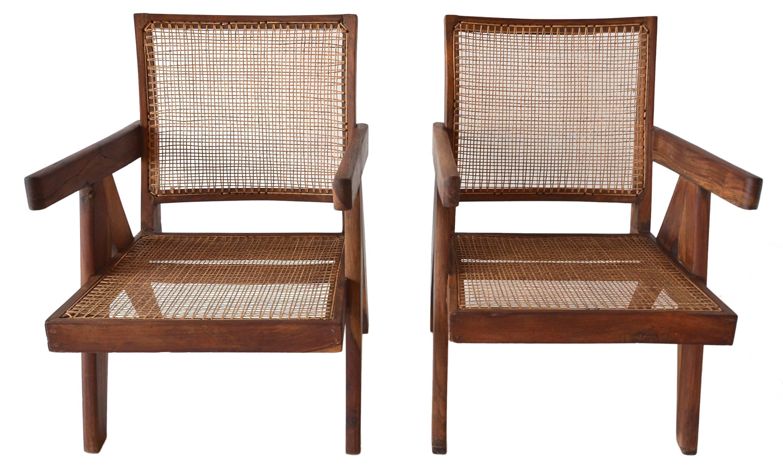 An exceptional correct pair of low lounge chairs by Pierre Jeanneret of the Chandigarh project, circa 1955.

These chairs are in exceptional condition and are created from solid Indian Rosewood. 

A fine vintage pair. Renovated sympathetically