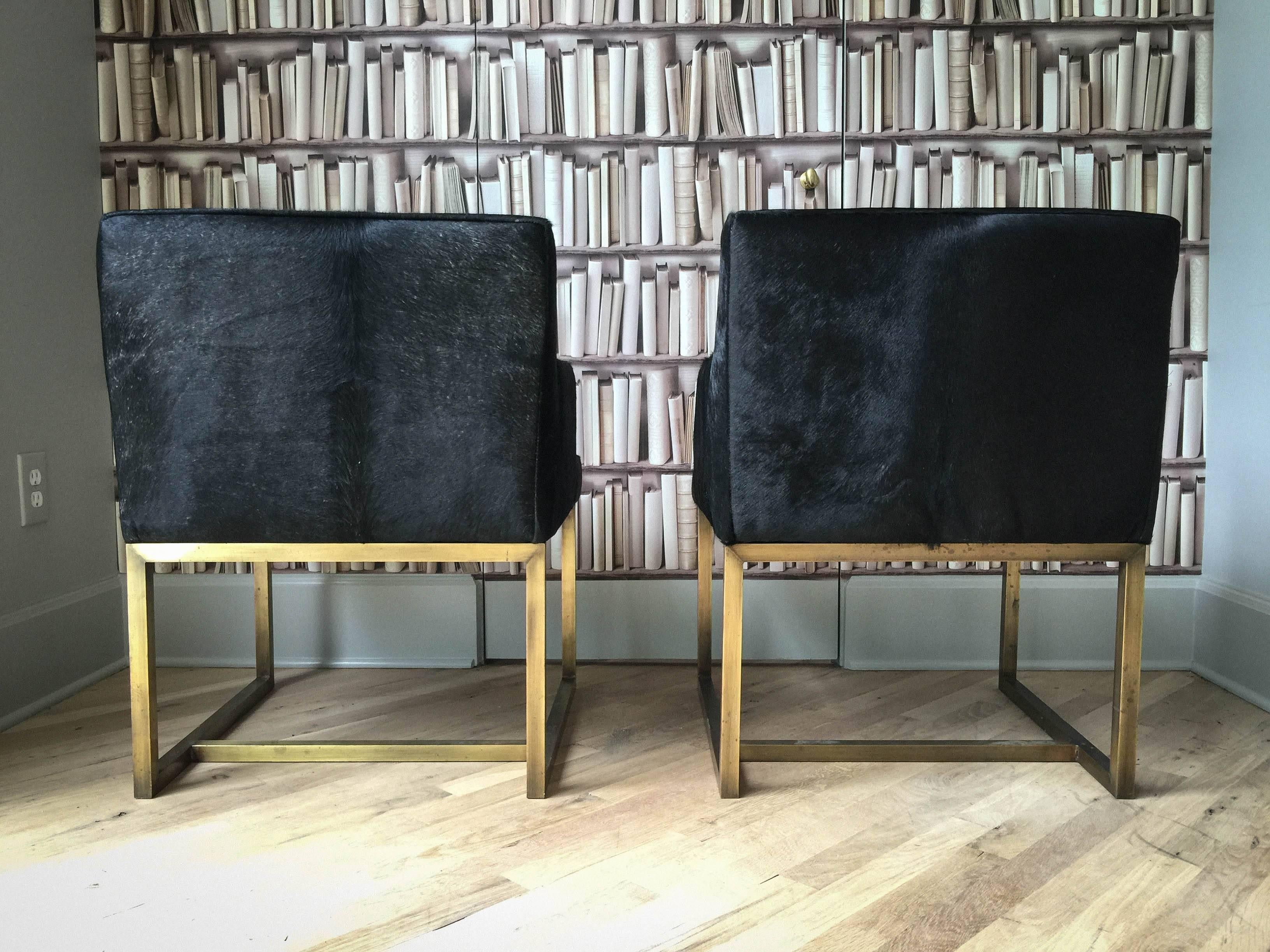 Pair of Mid-Century Swedish Brass and Black Hide Chairs 1