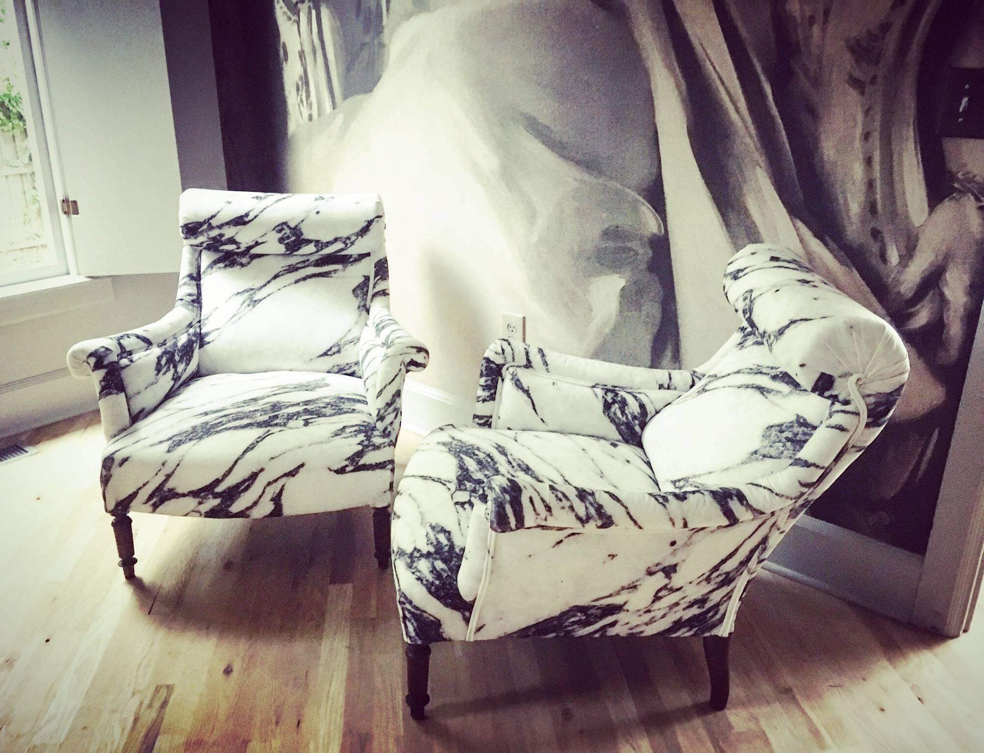 Outstanding pair of antique scroll back chairs newly upholstered in custom marble cotton fabric, double welt. Very comfortable, slightly reclined with a perfectly fitting headrest, walnut legs.