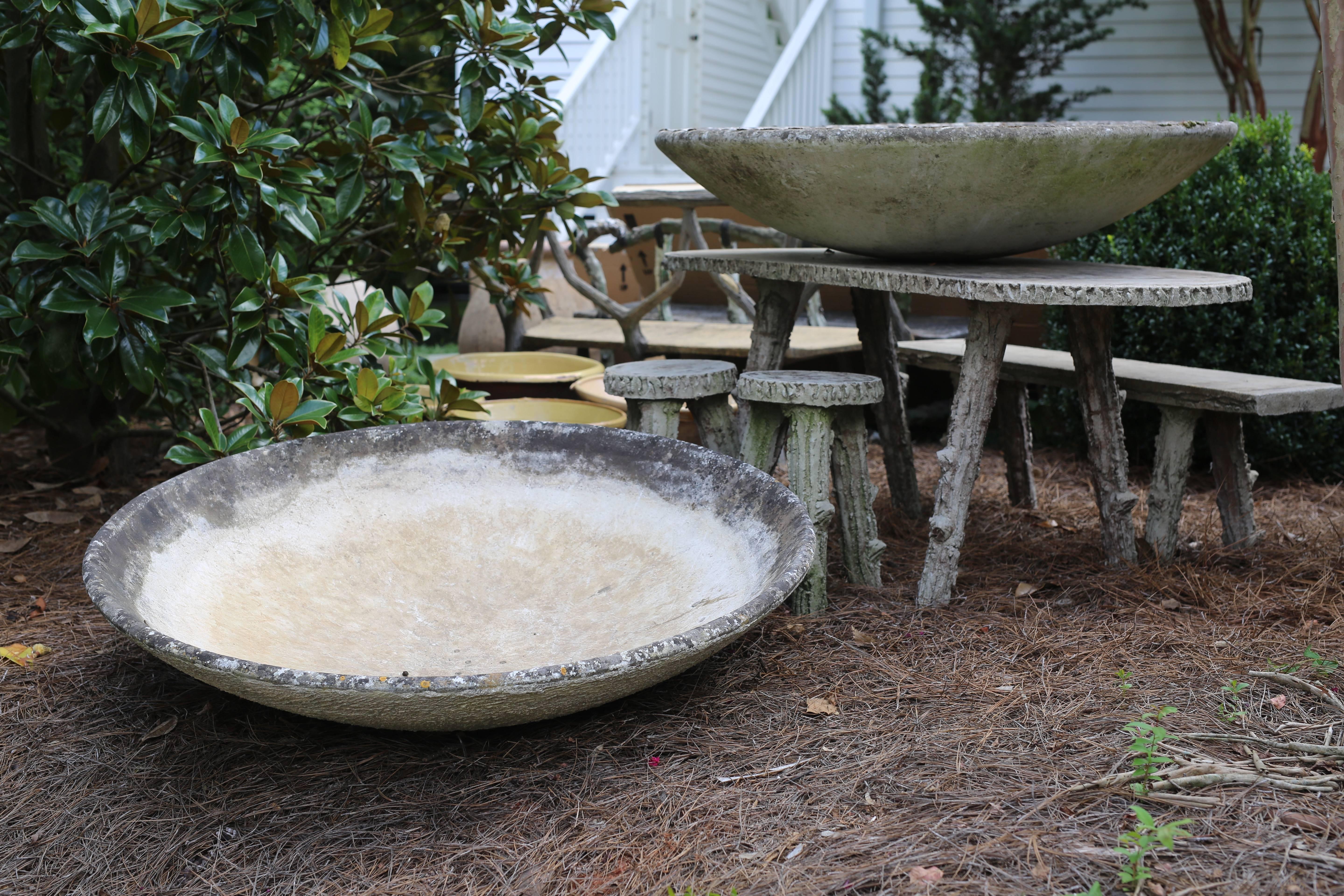 Pair of Giant Willy Guhl saucer planters from Sweden made from fibrated cement. Stamped and marked. May be purchased separately for $2750 each or as a pair for $5,000.