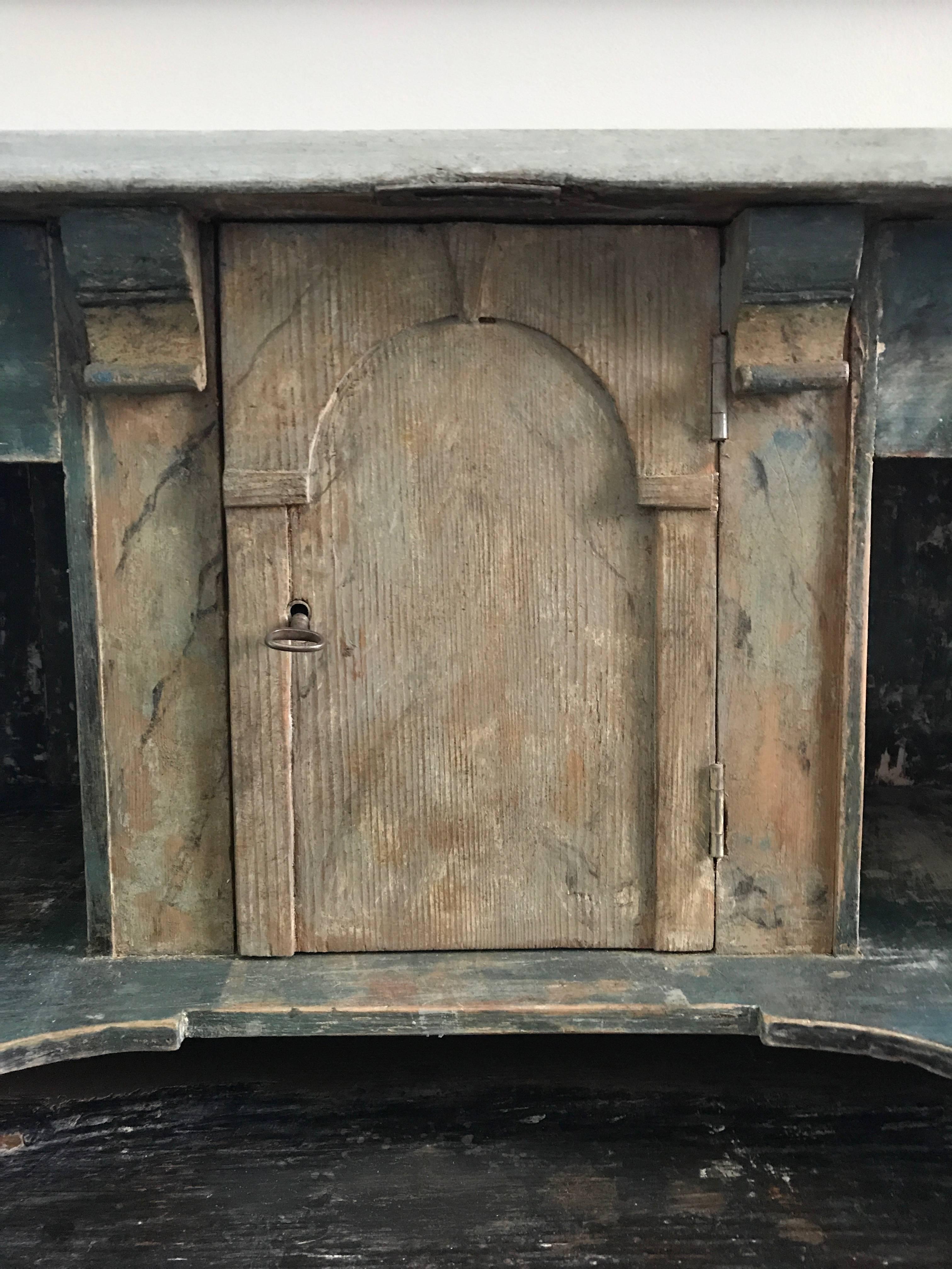 18th century Swedish drop front secretary with faux marble painted interior. Beautiful original painted finish. Eight interior compartments over two lower drawers. Original hardware. Interior cabinet has a beautifully painted faux marble treatment.