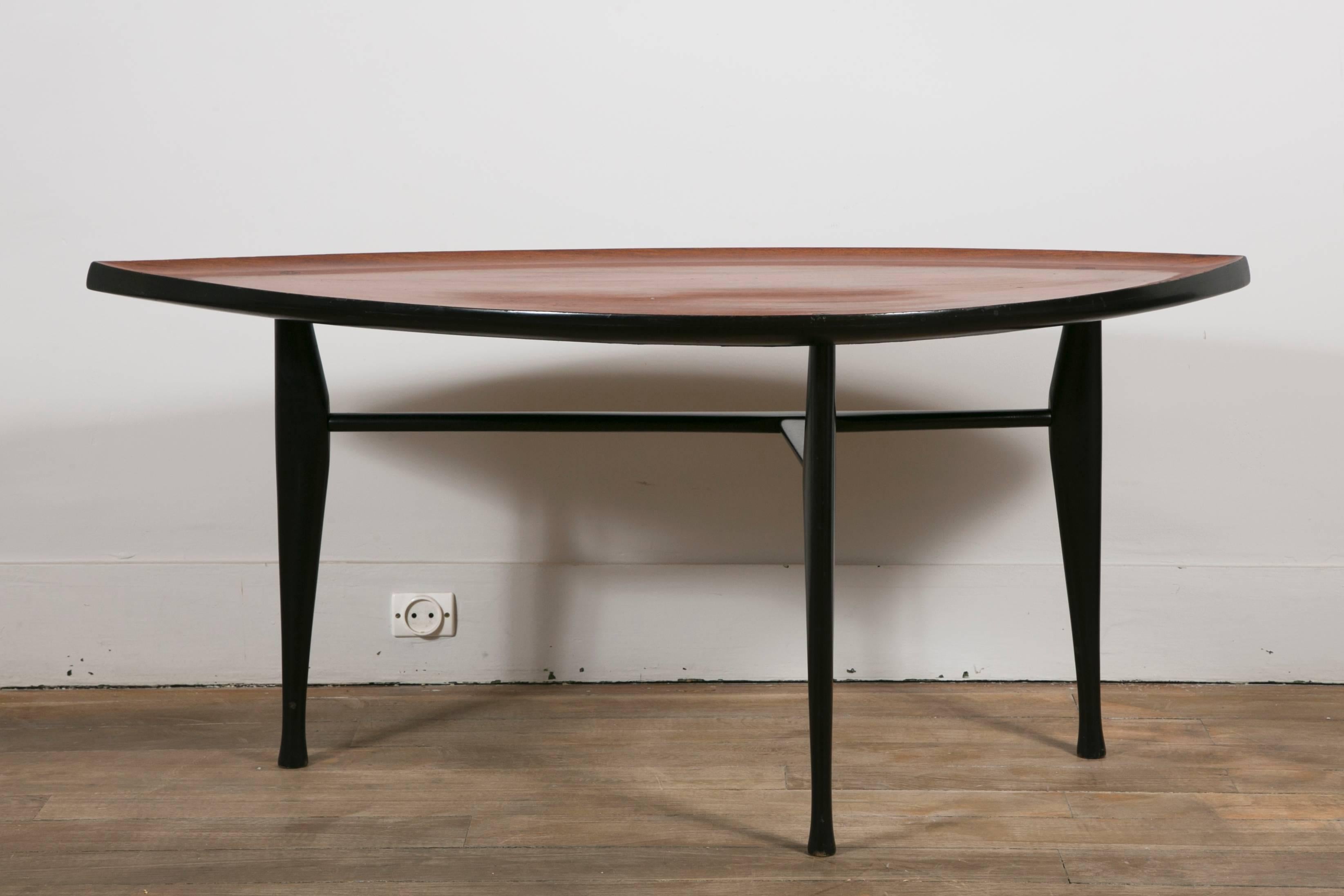 Rosewood leaf shaped top.
Three black lacquered legs.
By Yngve Ekstrom.
Made by Westerbergs Furniture.
Sweden, 1954.
 