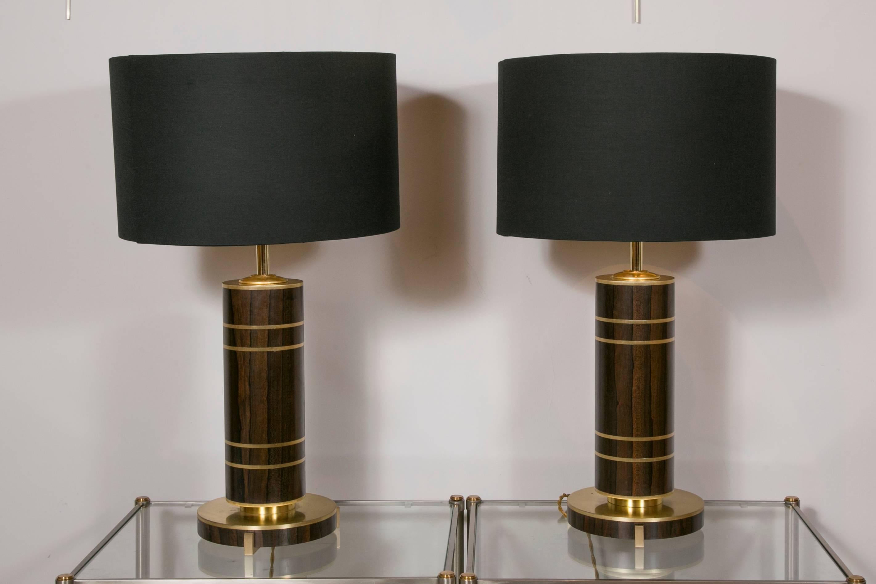 Pair of cylindrical mahogany and brass lamps in Art Deco style,
France, circa 1980.



 