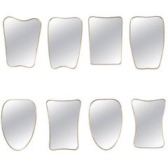 Collection of Eight Brass Framed Wall Mirrors in the Style of Gio Ponti