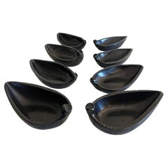 Set of 8 black glazed cups/ bowls/ vide- poche; Accolay, 1960's