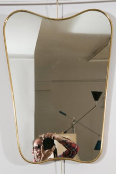 Collection of Eight Brass Framed Wall Mirrors in the Style of Gio Ponti