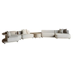 Sofá modular curvo Venturi de JNK Miami con consola integrada