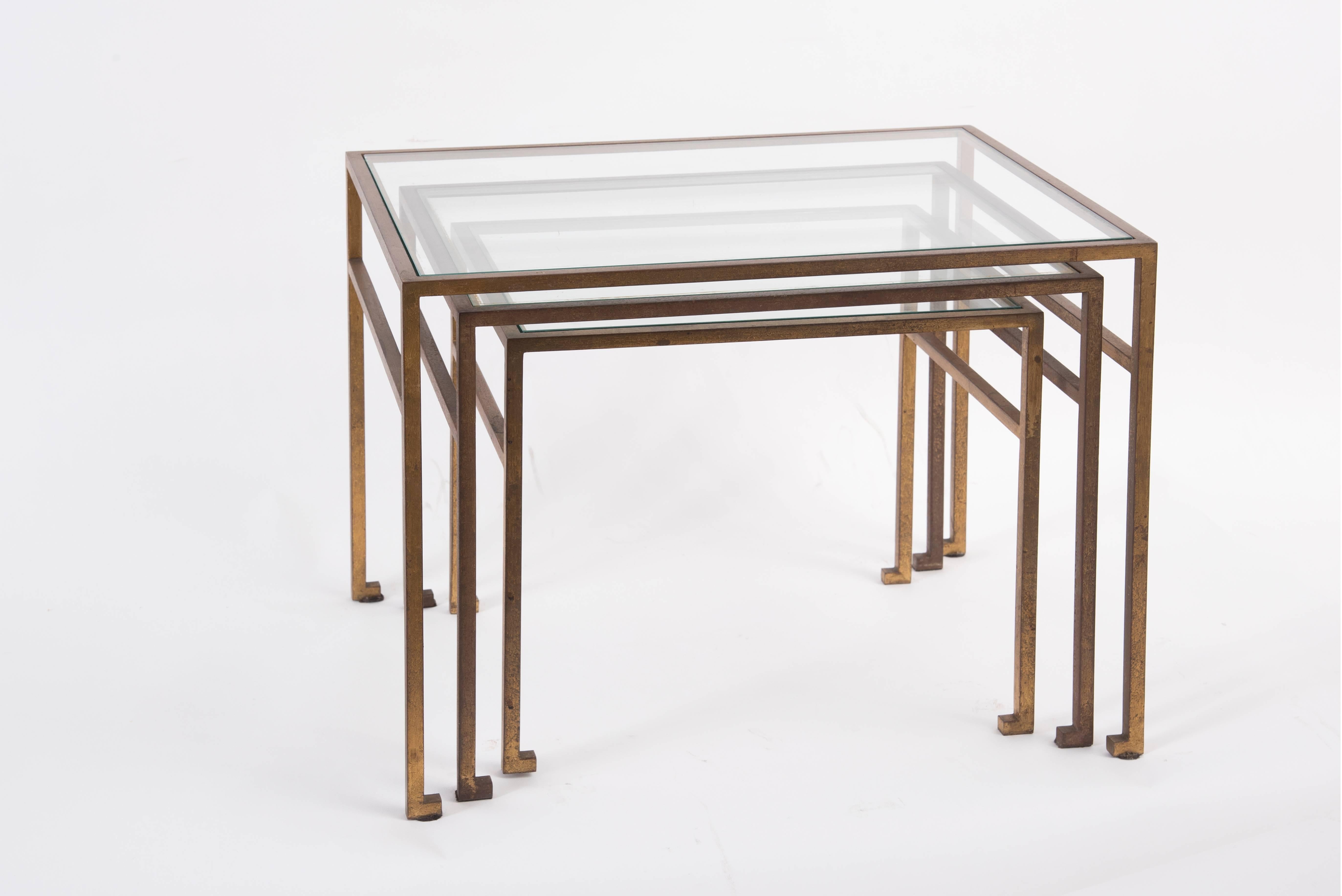 Ramsay House,
gigogne coffee table,
gilded iron and glass,
circa 1970, France.
Measures of the highest to the lowest:
1 / Height: 41 cm, width 53 cm, depth: 38 cm,
2 / Height: 38 cm, width 46 cm, depth: 34 cm,
3 / Height: 34 cm, width 39 cm,