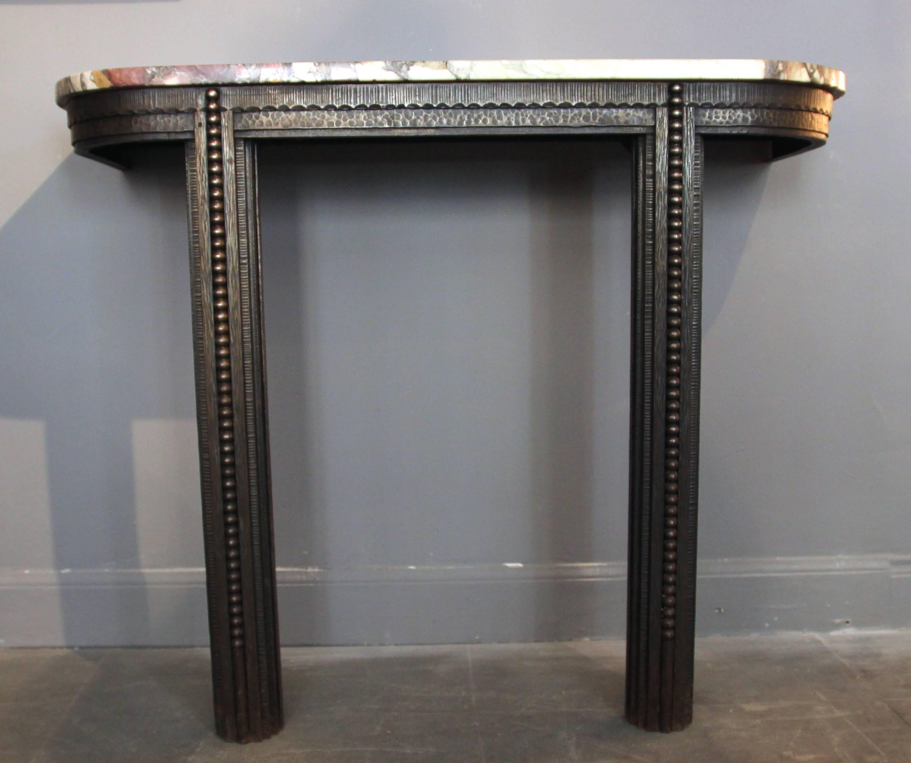 Style Edgar Brandt, console,
iron sculpted and marble top,
circa 1925, France.
Measures: Height 91 cm, width 110 cm, depth 40 cm,
Top thickness: 2 cm.