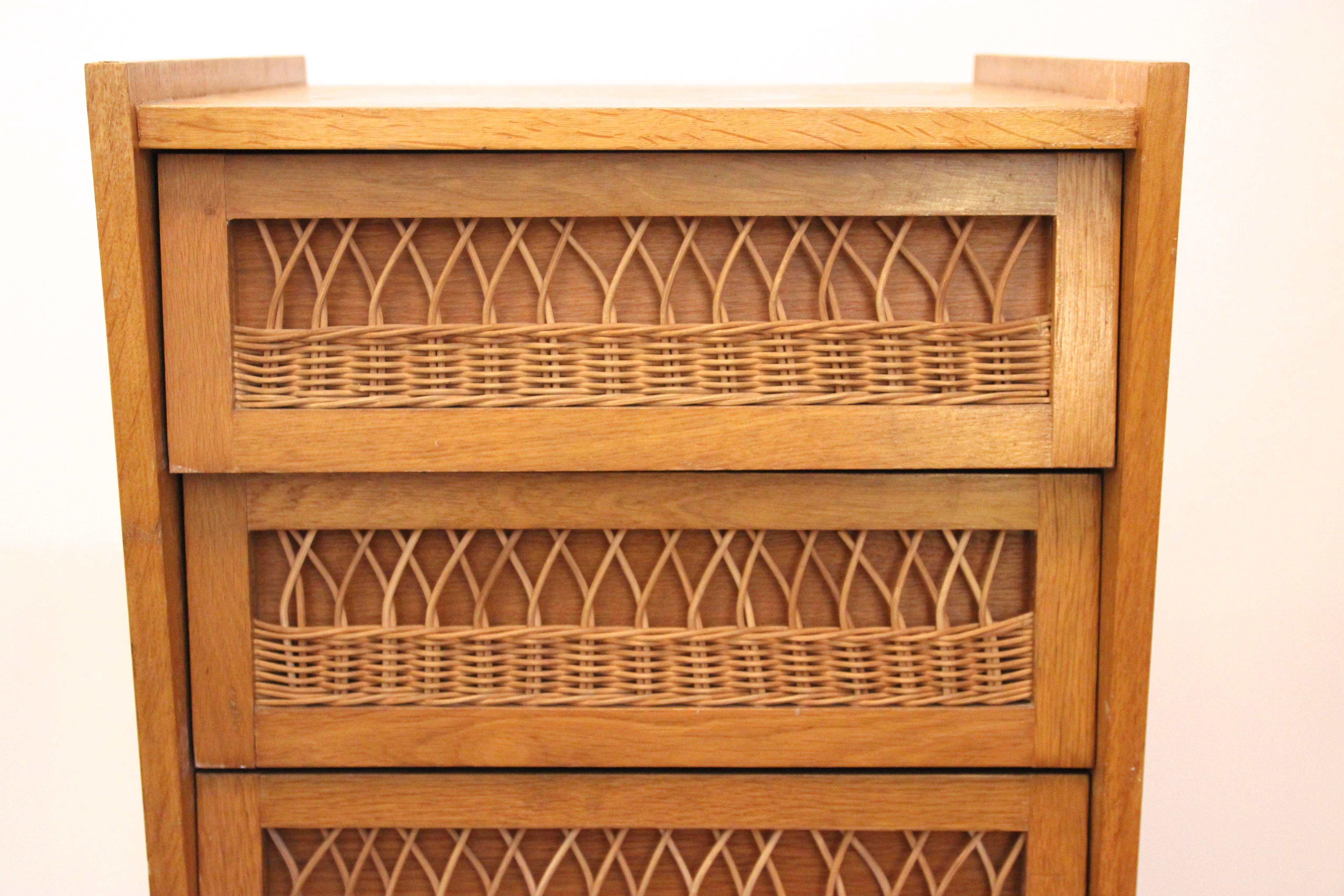 Buffets in the style of Audoux-Minet.
Wood and wicker, 
circa 1970, France.
Measures: Height: 106 cm, largeur: 52 cm, depth: 45 cm.