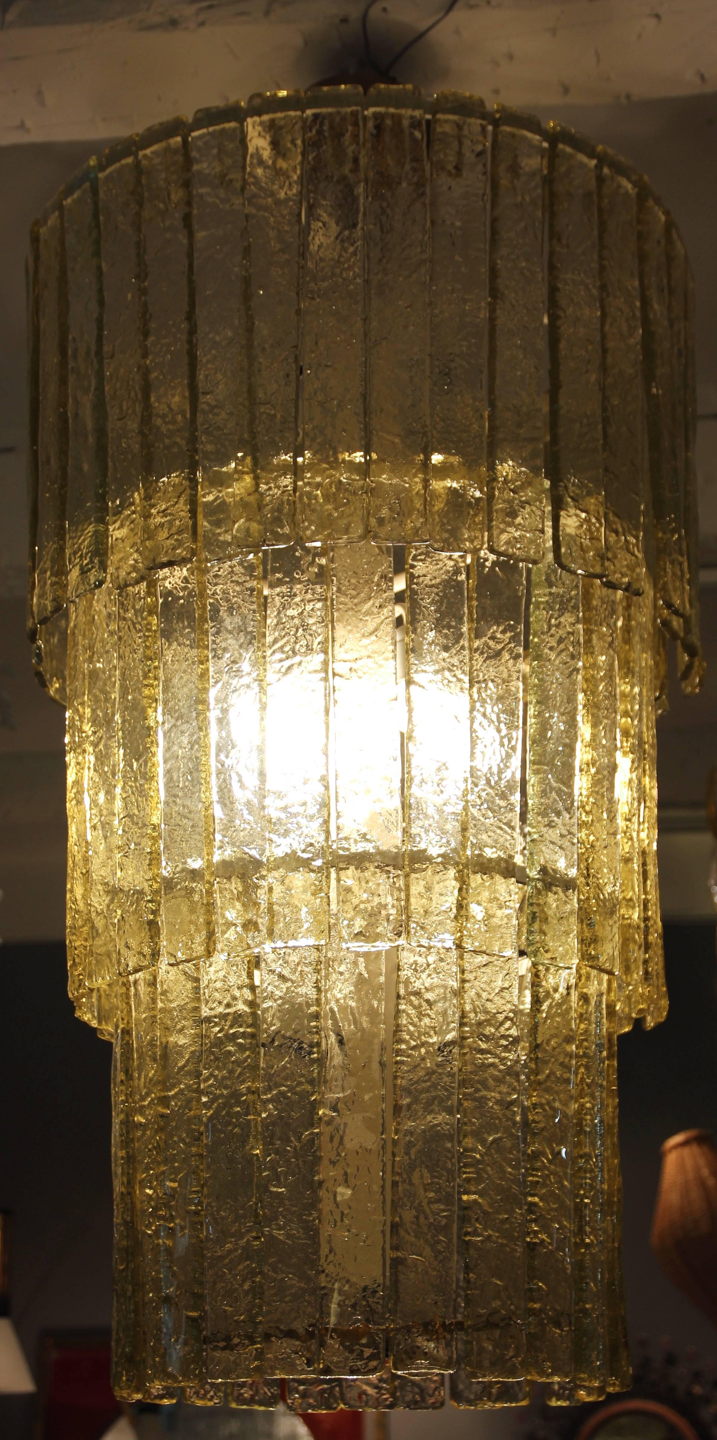 Mazzega, pair of important chandeliers,
Venini glass,
circa 1970, Italy.
Measures: Height: 130 cm, diameter: 63 cm.