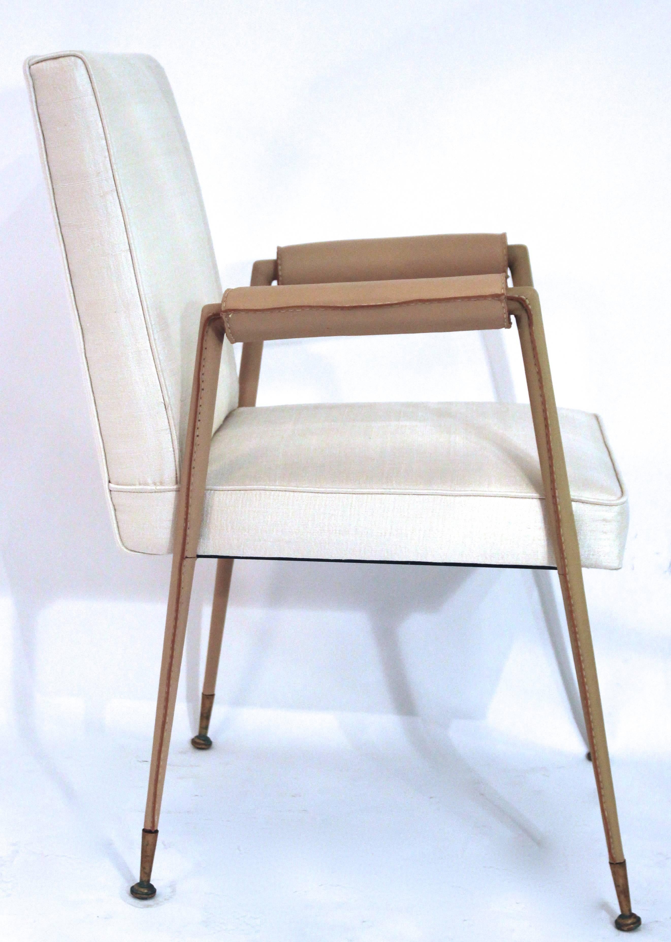 Jules et André Leleu, set of four chairs, 
model "du Salon de Bridge", "Paquebot de France"
leather, silk and gilded brass, 
circa 1960, France.
Measures: Height 86 cm, seat height 45 cm, depth 43 cm, width 60 cm.

Similar