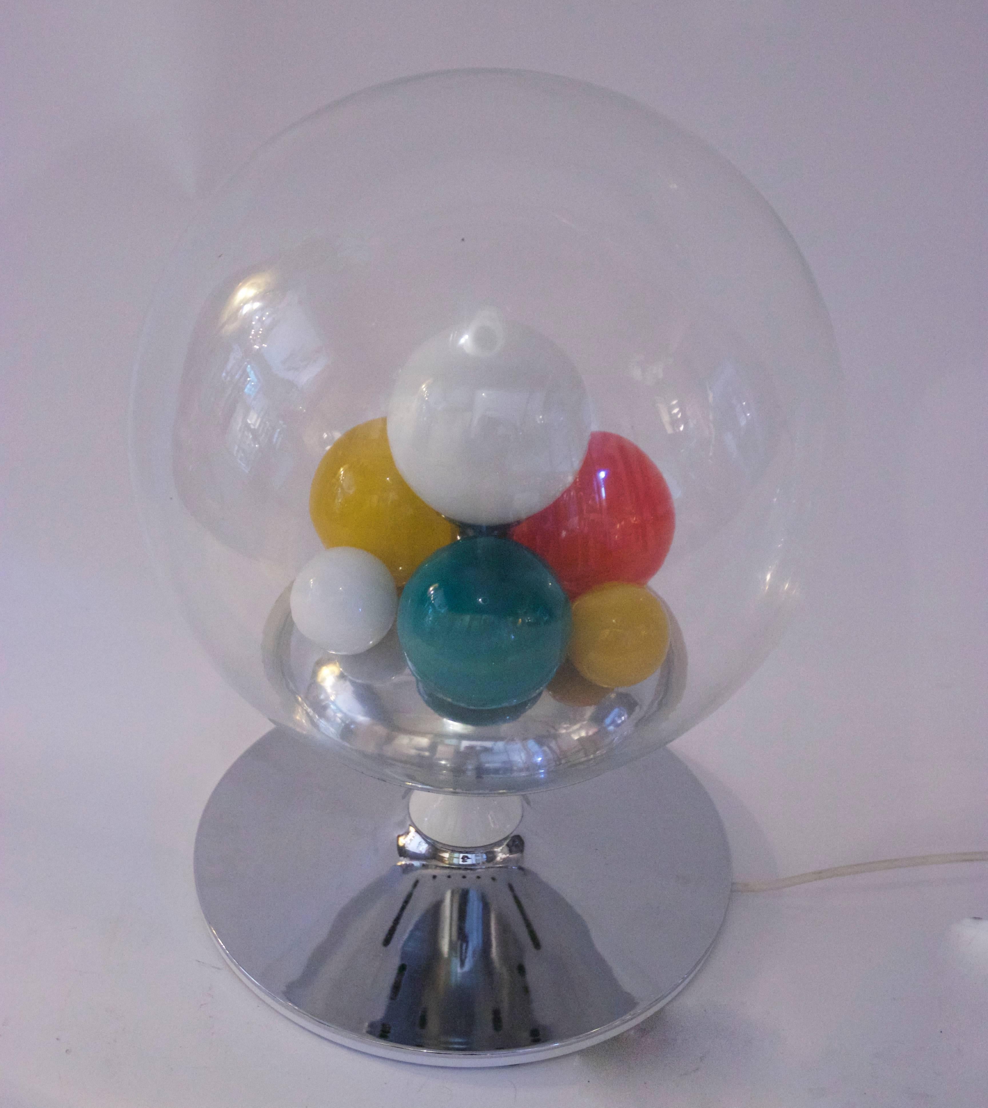 Angelo Brotto, table lamp, 
metal and glass, enamelled and chromed metal, transparent blown and colored glass balls,
Esperia production, 
circa 1965, Italy.
Height: 50 cm, diameter: 30 cm.