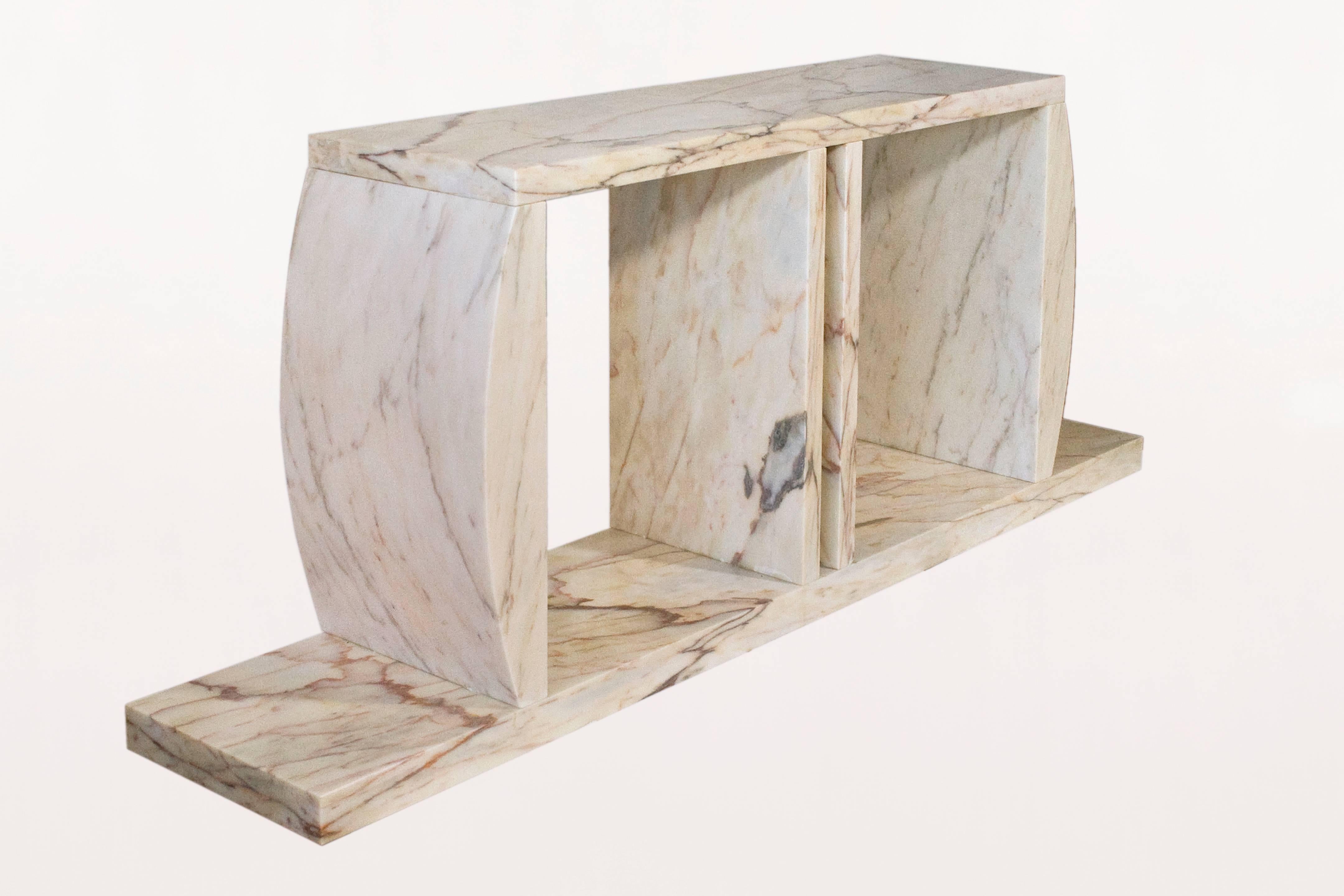 Marble Console Table made by Ettore Sottsass,
Sottsass Associati Custom designed for Max Palevsky's Malibu Home,
unique piece for Max Palevsky's Malibu Home,
Circa 1984, Italy.
Height: 70 cm, length: 1m80, depth: 35 cm.
Repair based on the