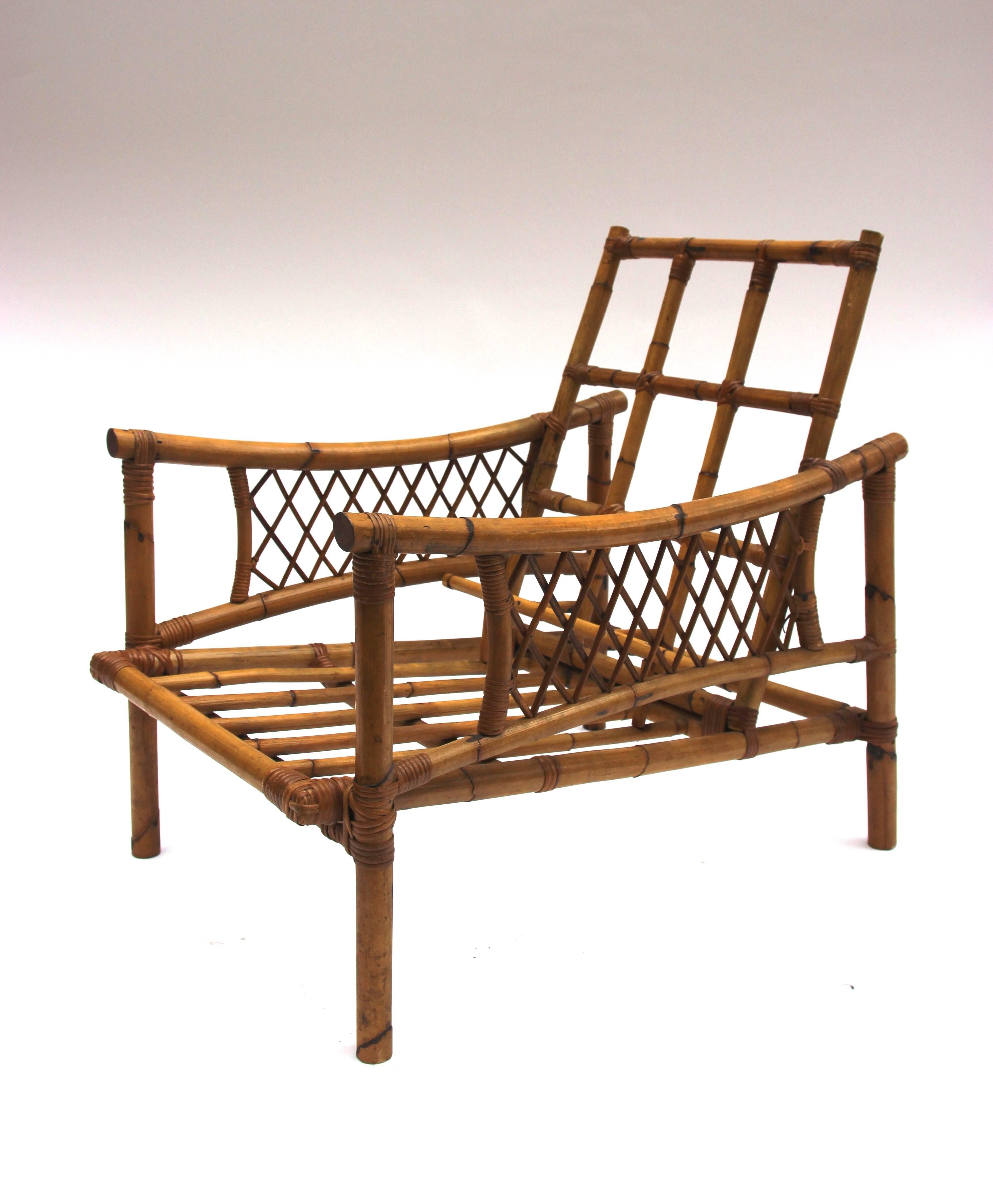 Pair armchairs,
Bamboo,
circa 1970, France.
Height: 76 cm, width 56 cm, depth: 80 cm,
Seat height: 28 cm.