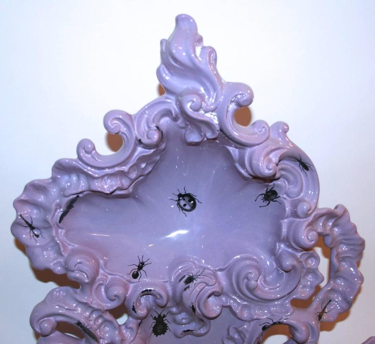 Mirror decorated with insects in the Style of Louis XV, 
Furiosa Edition,
Purple ceramic,
Tracery and shell decoration,
circa 2010, Italy.

Measures: Height 1m34, width 72 cm, depth 7 cm.