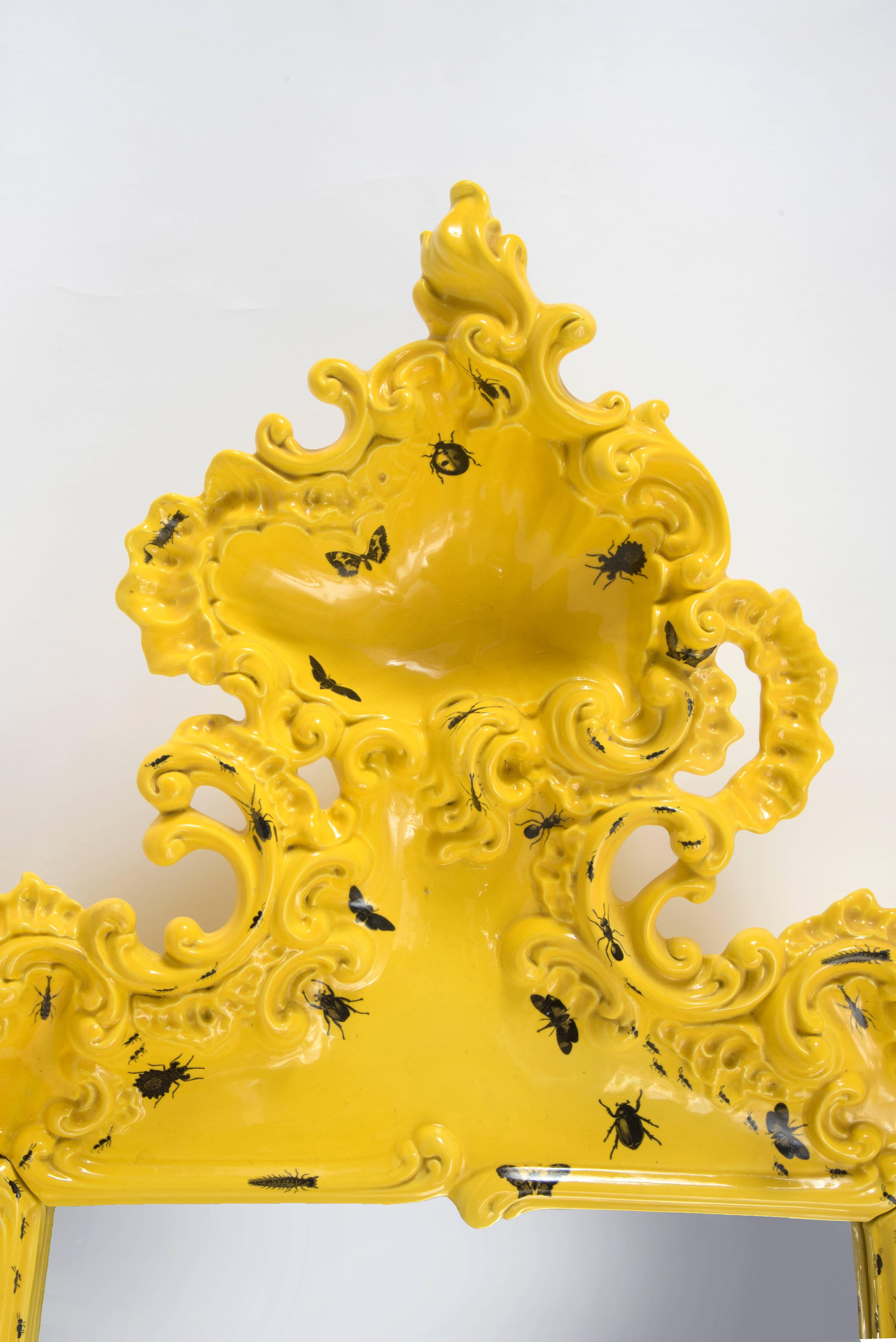 Mirror decorated with insects,
Furiosa edition purple ceramic, 
circa 2010, Italy.
Height: 134 cm, width: 72 cm, depth: 7 cm.